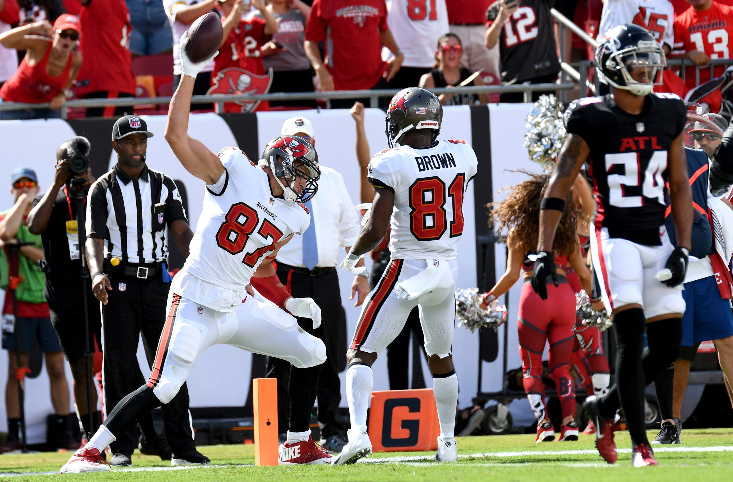 Sep 19, 2021; Tampa, Florida, USA; Tampa Bay Buccaneers tight end Rob Gronkowski (87) celebrates with wide receiver Antonio Brown (81) after scoring a touchdown in the first half against the Atlanta Falcons at Raymond James Stadium. Mandatory Credit: Jonathan Dyer-USA TODAY Sports