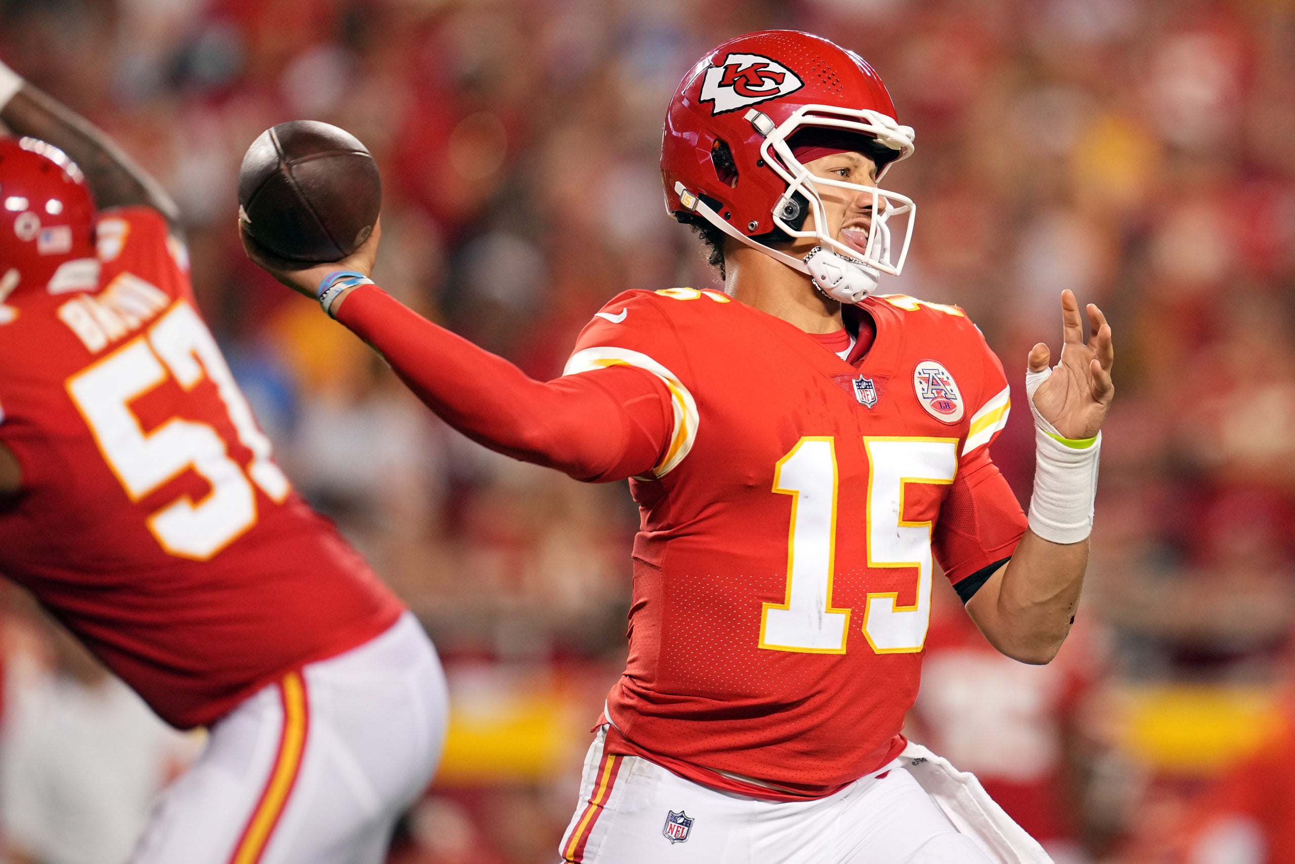 Sep 15, 2022; Kansas City, Missouri, USA; Kansas City Chiefs quarterback Patrick Mahomes (15) throws against the Los Angeles Chargers during the second half at GEHA Field at Arrowhead Stadium. Mandatory Credit: Jay Biggerstaff-USA TODAY Sports