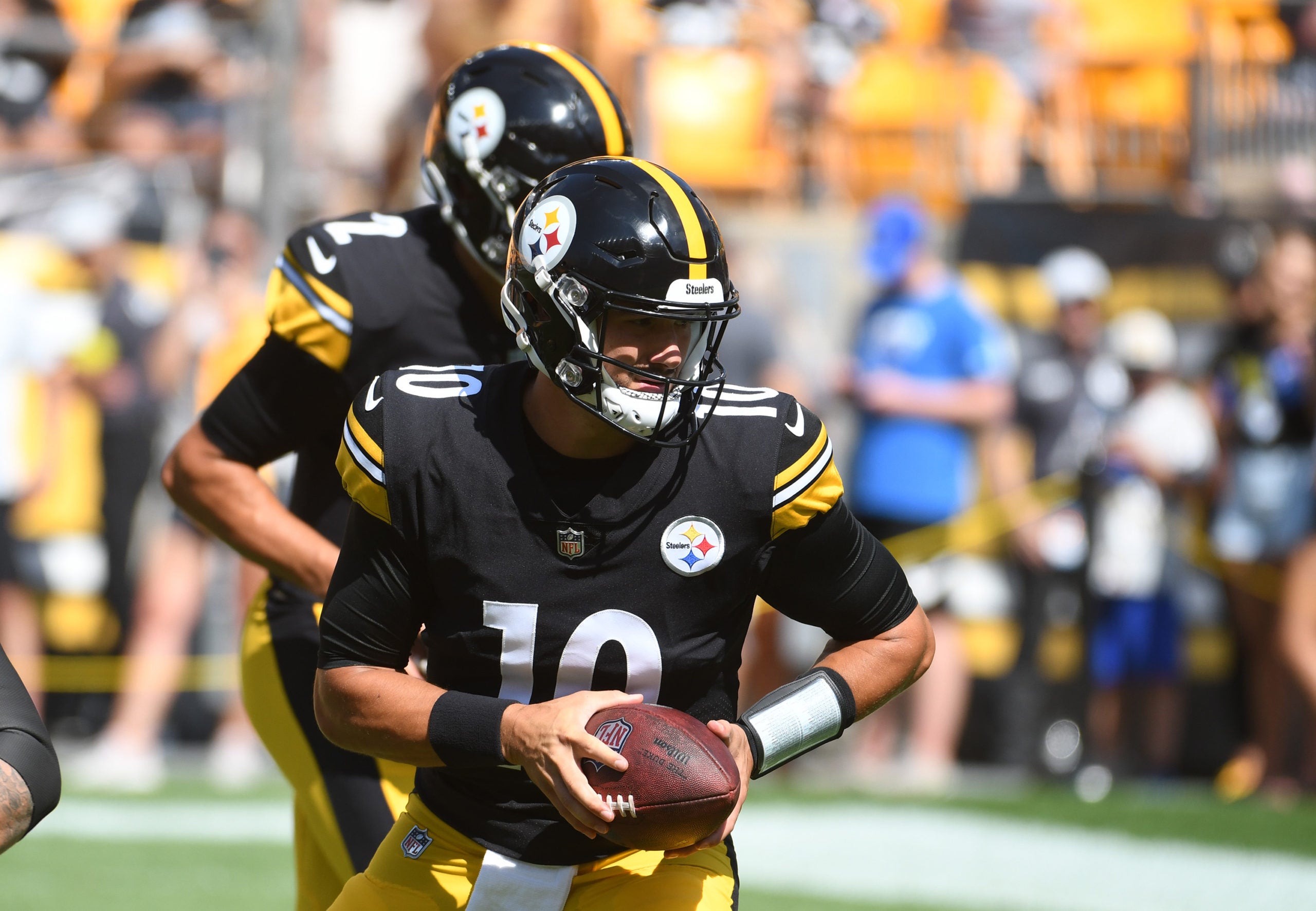 Aug 28, 2022; Pittsburgh, Pennsylvania, USA;  Pittsburgh Steelers quarterbacks Mitch Trubiski (10) and Mason Rudolph (2) take snaps before playing the Detroit Lions at Acrisure Stadium. Mandatory Credit: Philip G. Pavely-USA TODAY Sports