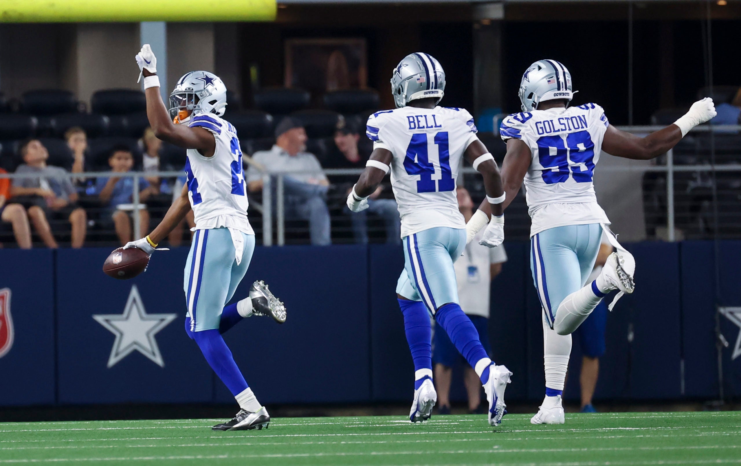 Aug 26, 2022; Arlington, Texas, USA;  Dallas Cowboys safety Israel Mukuamu (24) celebrates with teammates after making an interception during the first quarter against the Seattle Seahawks at AT&T Stadium. Mandatory Credit: Kevin Jairaj-USA TODAY Sports