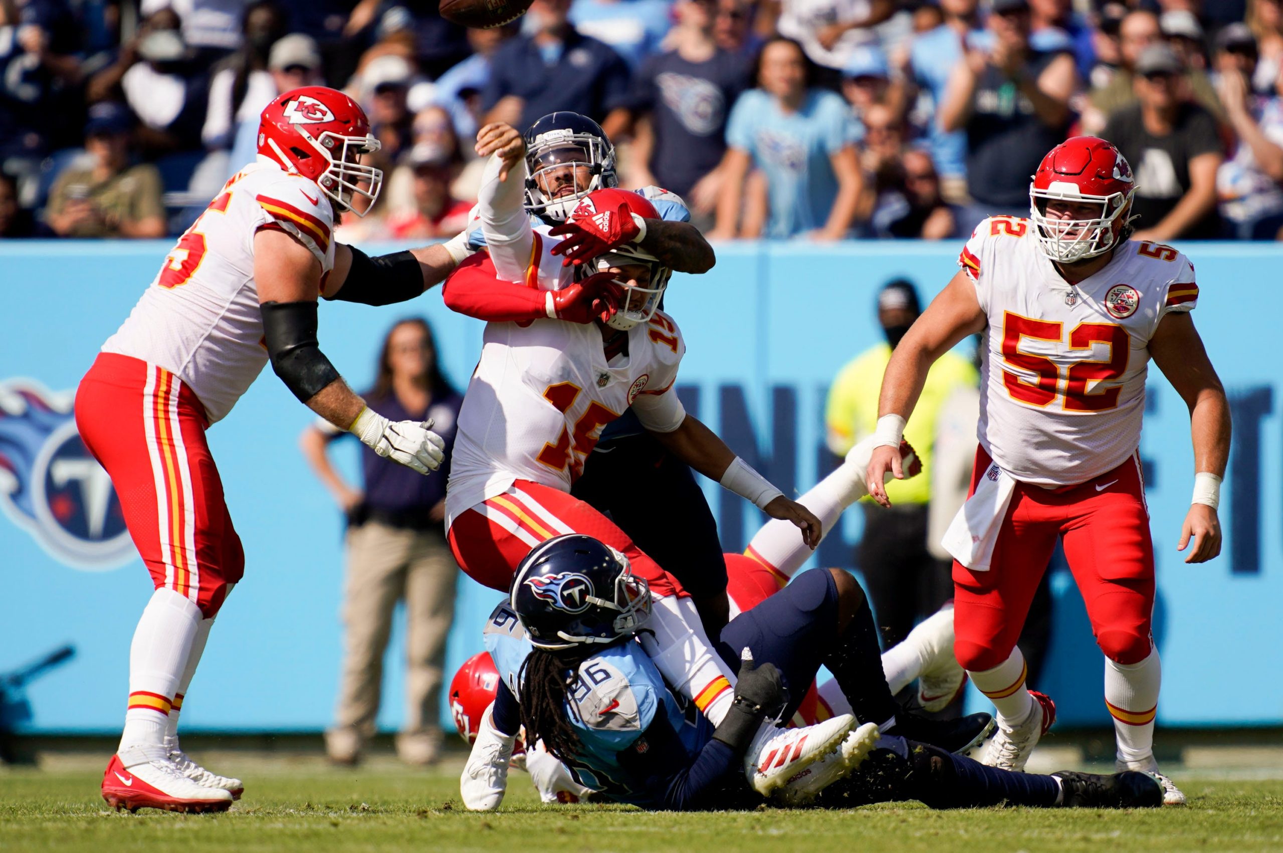 Tennessee Titans defensive end Denico Autry (96) and Tennessee Titans outside linebacker Harold Landry (58) sack Kansas City Chiefs quarterback Patrick Mahomes (15) during the second quarter at Nissan Stadium Sunday, Oct. 24, 2021 in Nashville, Tenn. Titans Chiefs 091