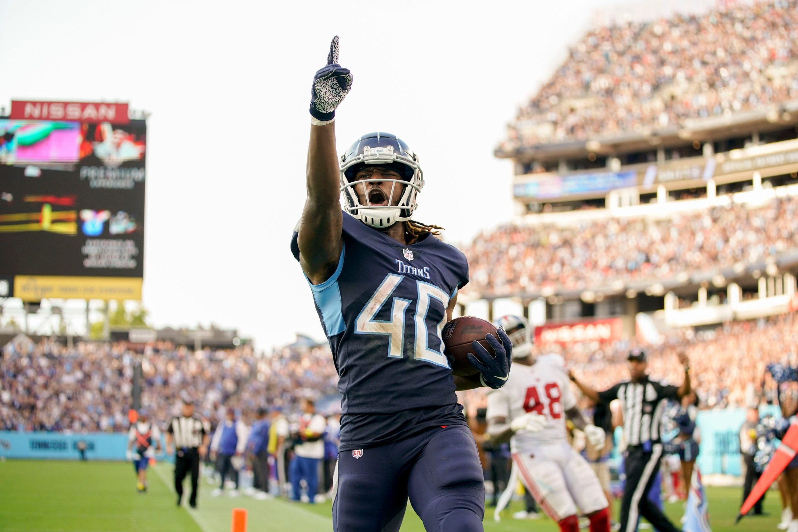 Tennessee Titans running back Dontrell Hilliard (40) scores a touchdown during the third quarter at Nissan Stadium Sunday, Sept. 11, 2022, in Nashville, Tenn. Nfl New York Giants At Tennessee Titans