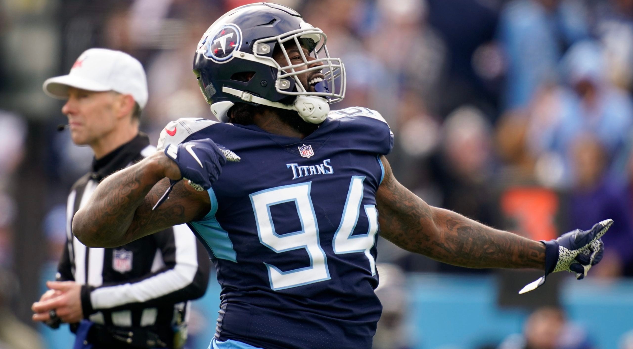 Tennessee Titans defensive end Mario Edwards Jr. (94) celebrates after sacking Denver Broncos quarterback Russell Wilson (3) in the first quarter at Nissan Stadium Sunday, Nov. 13, 2022, in Nashville, Tenn. Nfl Denver Broncos At Tennessee Titans