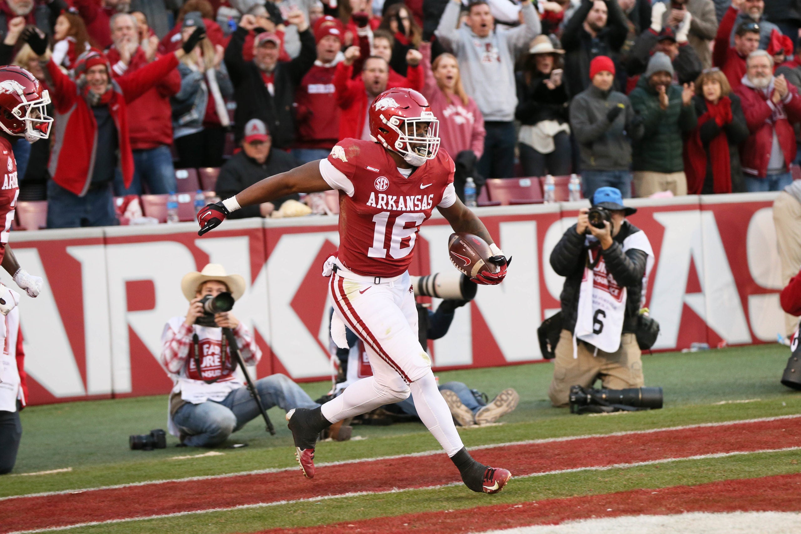 Nov 26, 2021; Fayetteville, Arkansas, USA; Arkansas Razorbacks wide receiver Treylon Burks (16) celebrates after a touchdown against the Missouri Tigers in the third quarter at Donald W. Reynolds Razorbacks Stadium. Arkansas won 34-17. Mandatory Credit: Nelson Chenault-USA TODAY Sports