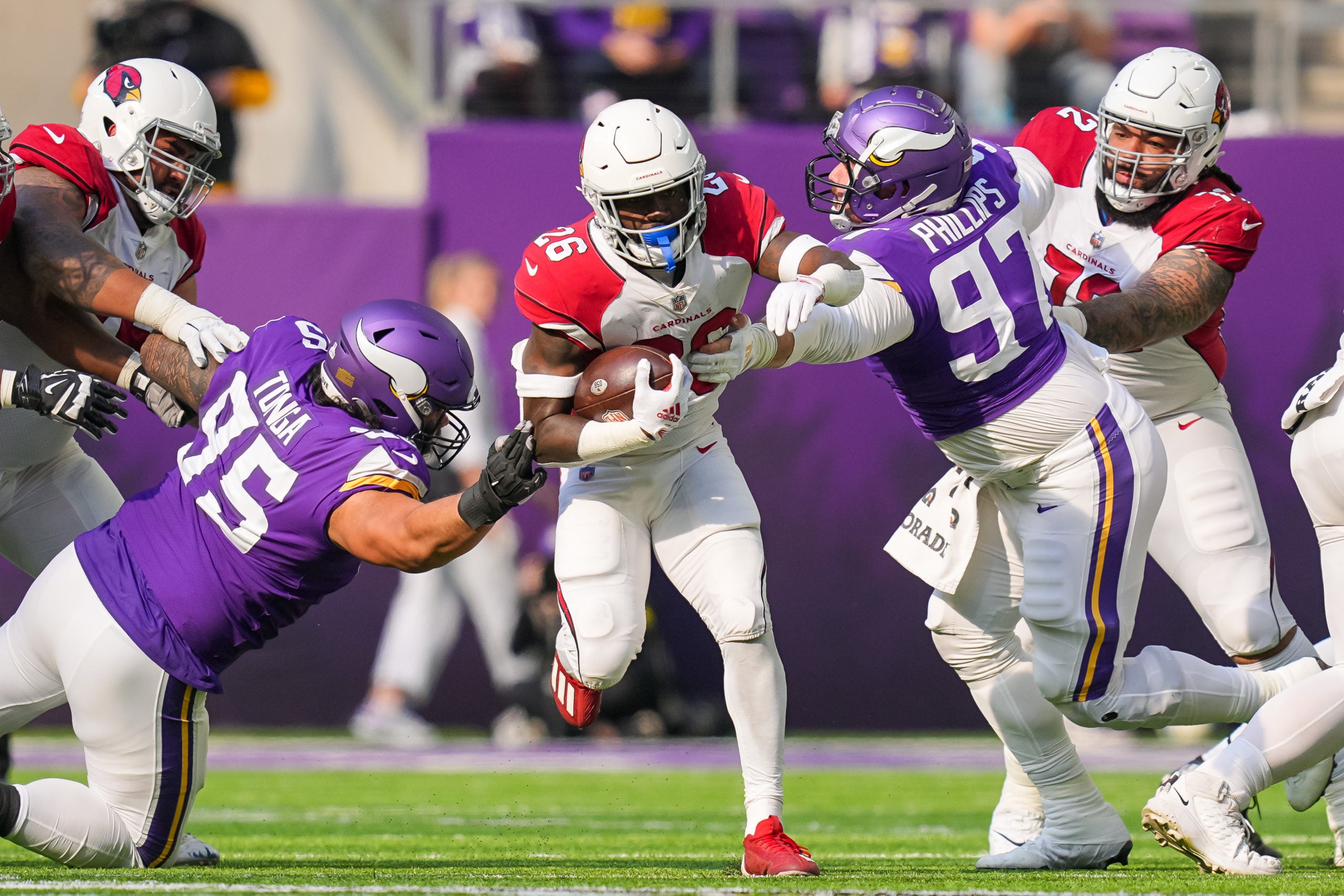 Oct 30, 2022; Minneapolis, Minnesota, USA; Arizona Cardinals running back Eno Benjamin (26) runs with the ball against the Minnesota Vikings in the second quarter at U.S. Bank Stadium. Mandatory Credit: Brad Rempel-USA TODAY Sports