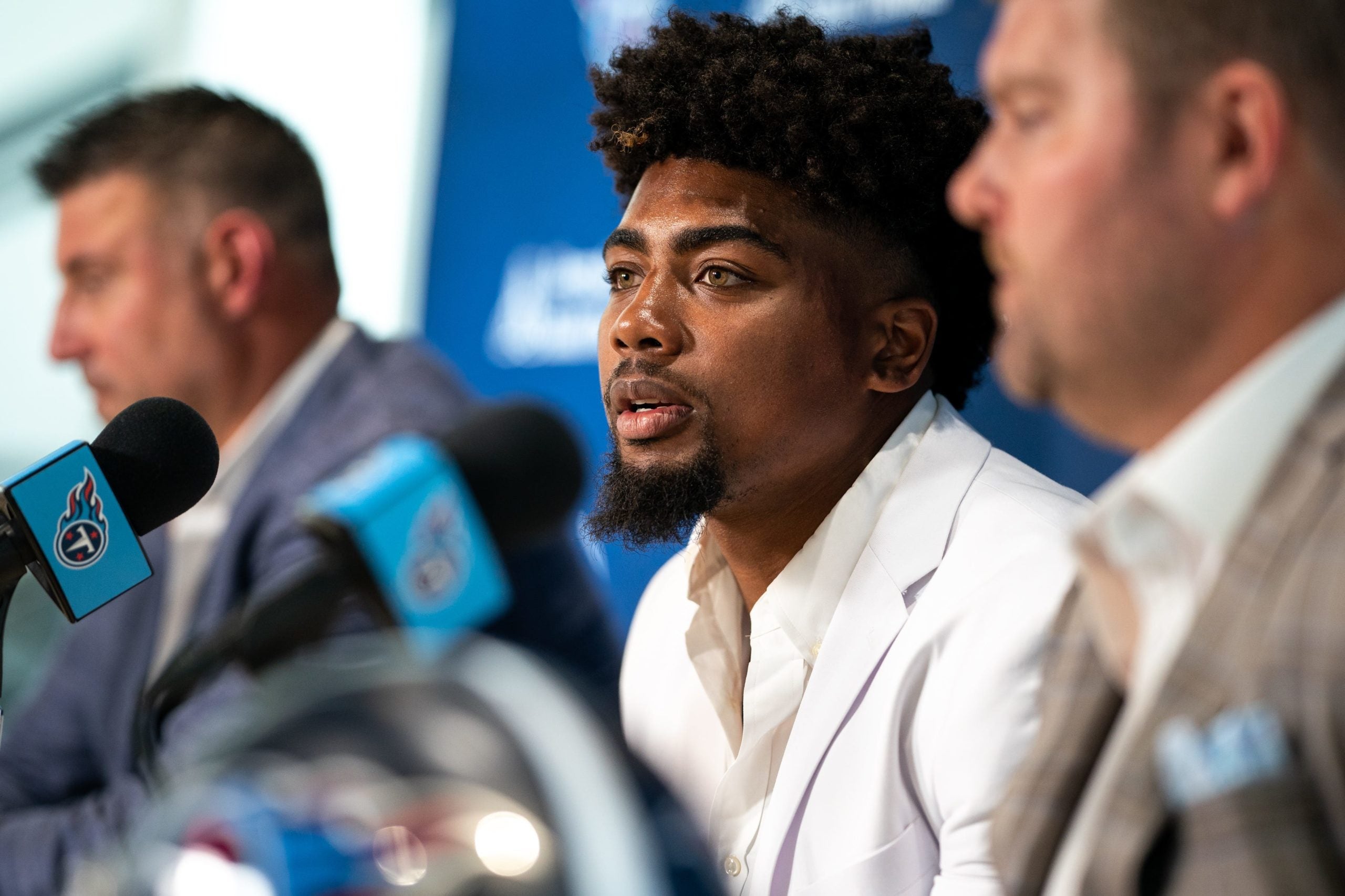 Tennessee Titans first round draft pick wide receiver Treylon Burks, center, speaks with head coach Mike Wrabel, left, and general manager Jon Robinson, right, during an introductory press conference at Saint Thomas Sports Park in Nashville, Tenn., Friday, April 29, 2022. Treylonburks 042922 An 006