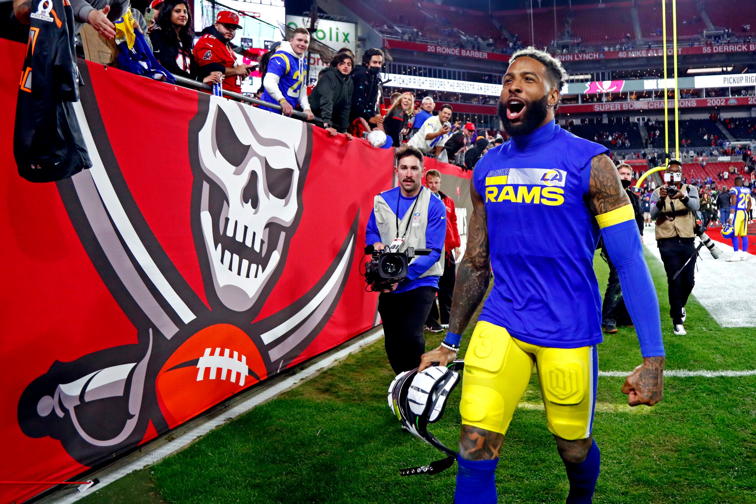 Jan 23, 2022; Tampa, Florida, USA; Los Angeles Rams wide receiver Odell Beckham Jr. (3) celebrates after beating the Tampa Bay Buccaneers in a NFC Divisional playoff football game at Raymond James Stadium. Mandatory Credit: Kim Klement-USA TODAY Sports
