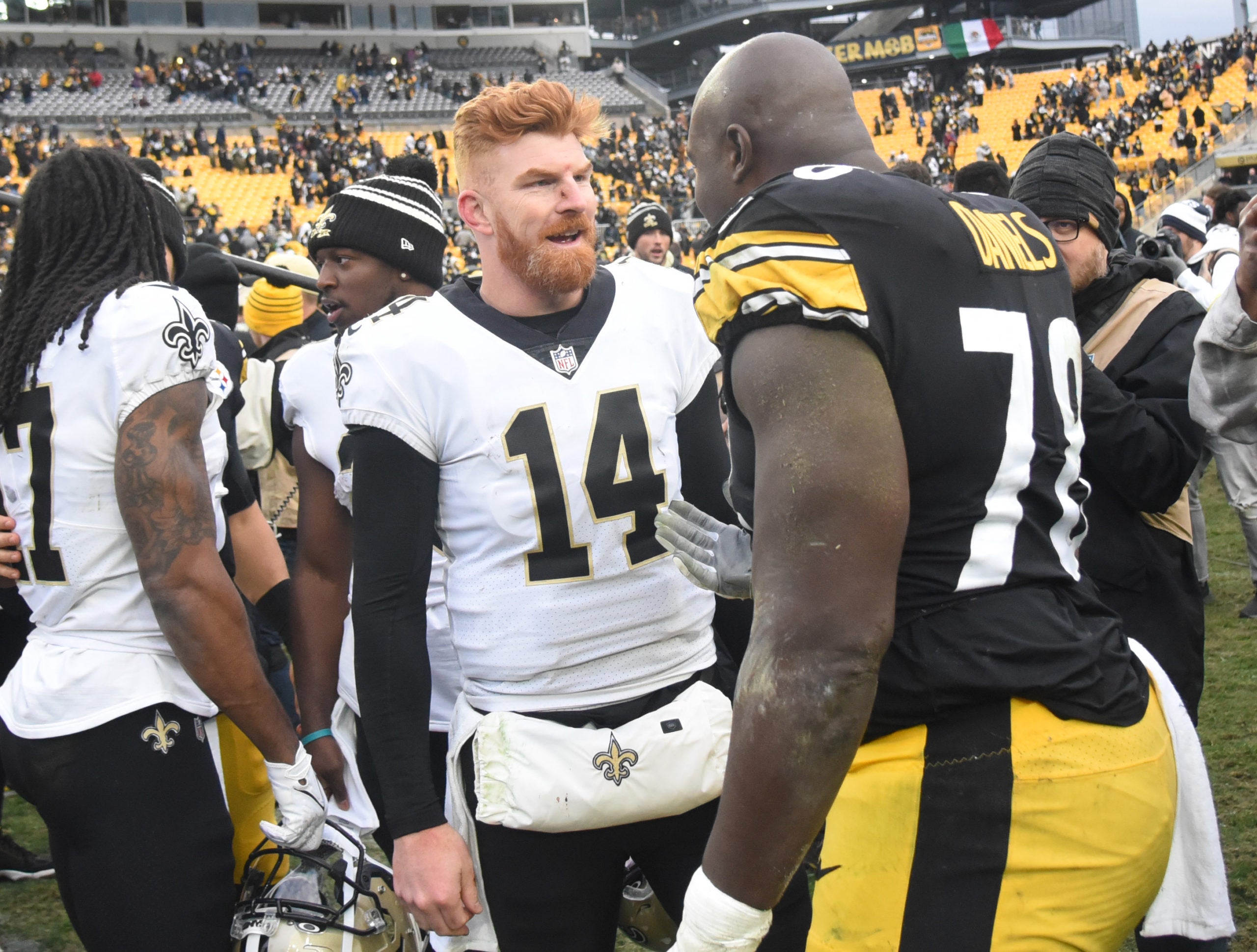 Nov 13, 2022; Pittsburgh, Pennsylvania, USA; Pittsburgh Steelers offensive lineman James Daniels (78) meets with New Orleans Saints quarterback Andy Dalton after the game at Acrisure Stadium. The Steelers won the game 20-10. Mandatory Credit: Philip G. Pavely-USA TODAY Sports