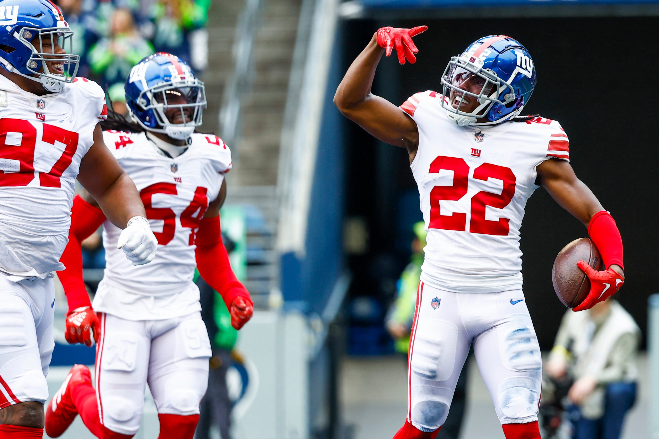 Oct 30, 2022; Seattle, Washington, USA; New York Giants cornerback Adoree Jackson (22) celebrates following a fumble recovery against the Seattle Seahawks during the second quarter at Lumen Field. New York Giants defensive tackle Dexter Lawrence (97) joins Jackson at left. Mandatory Credit: Joe Nicholson-USA TODAY Sports