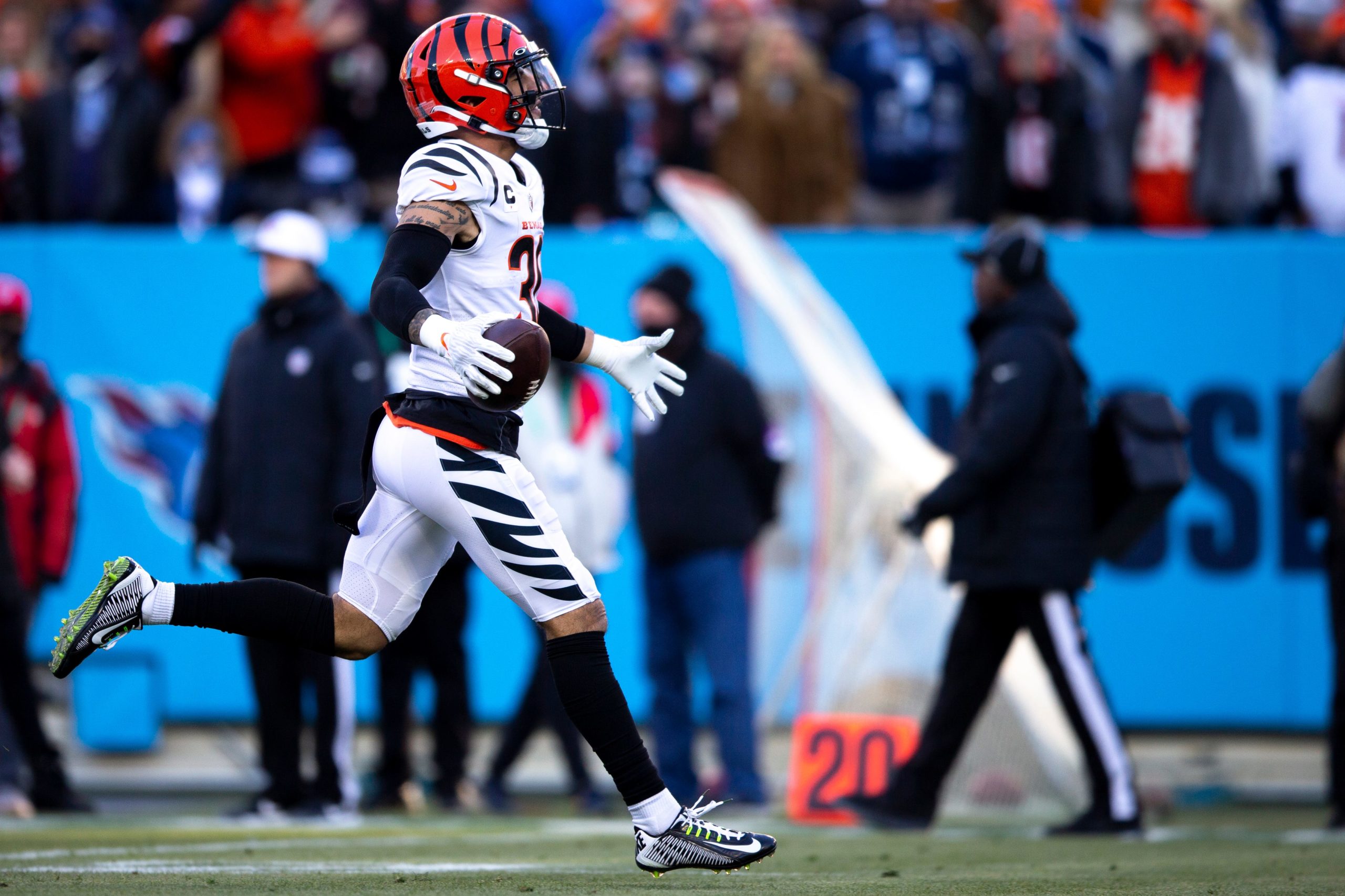 Cincinnati Bengals free safety Jessie Bates (30) celebrates after an interception during an NFL divisional playoff football game, Saturday, Jan. 22, 2022, at Nissan Stadium in Nashville, Tenn. Cincinnati Bengals defeated Tennessee Titans 19-16. Cincinnati Bengals At Tennessee Titans Divisional Playoff 70