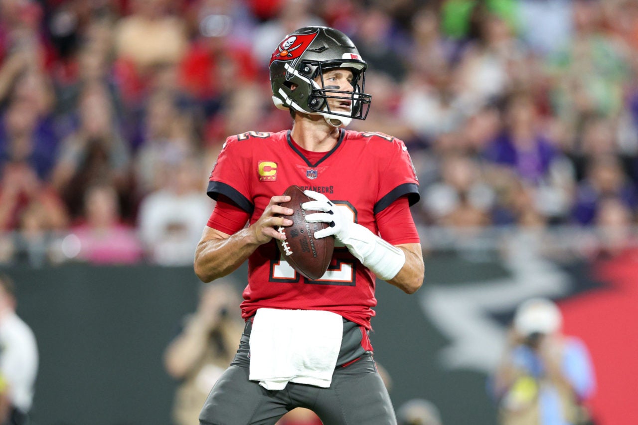 Oct 27, 2022; Tampa, Florida, USA; Tampa Bay Buccaneers quarterback Tom Brady (12) drops back to pass against the Baltimore Ravens in the second quarter  at Raymond James Stadium. Mandatory Credit: Nathan Ray Seebeck-USA TODAY Sports
