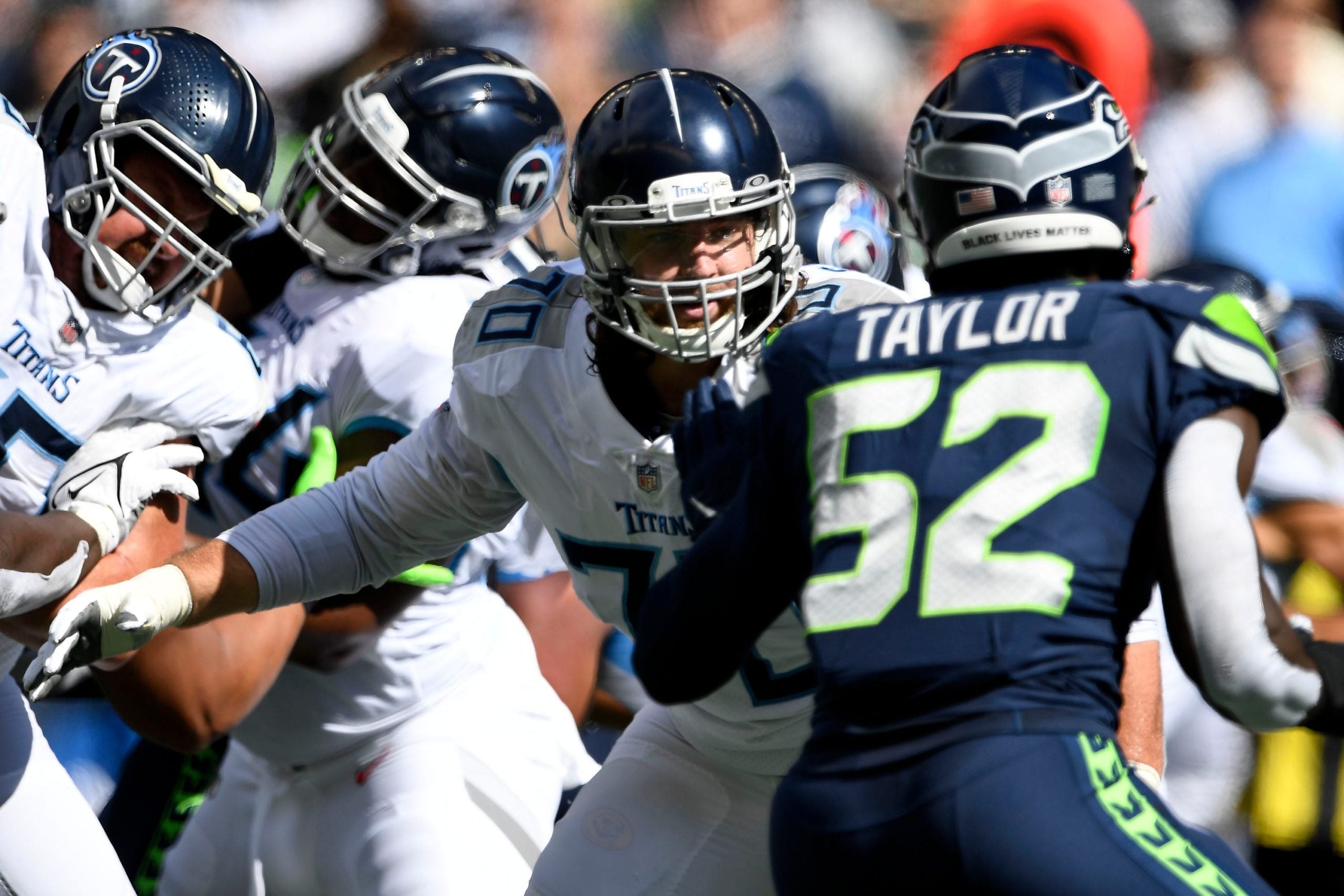 Tennessee Titans offensive tackle Ty Sambrailo (70) blocks Seattle Seahawks defensive end Darrell Taylor (52) during the first quarter at Lumen Field Sunday, Sept. 19, 2021 in Seattle, Wash. Titans Seahawks 043