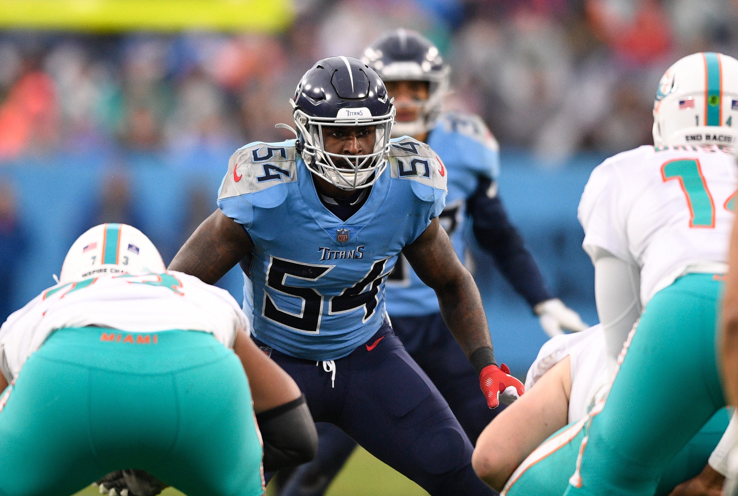 Jan 2, 2022; Nashville, Tennessee, USA;  Tennessee Titans inside linebacker Rashaan Evans (54) and Miami Dolphins quarterback Tua Tagovailoa (1) during the second half at Nissan Stadium. Mandatory Credit: Steve Roberts-USA TODAY Sports