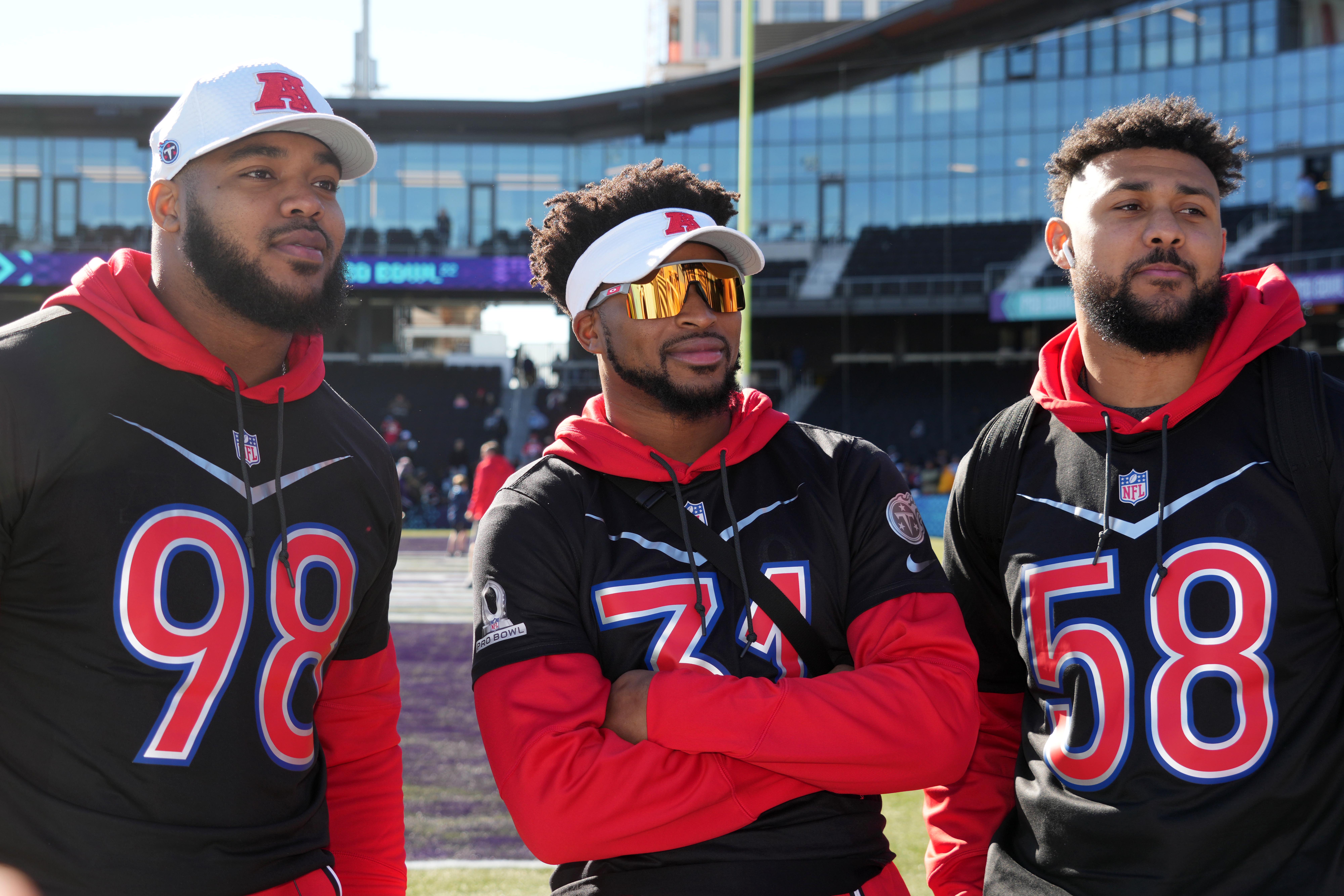Feb 3, 2022; Las Vegas, NV, USA; Tennessee Titans defensive tackle Jeffery Simmons (98), safety Kevin Byard (31) and linebacker Harold Landry III (58) pose during AFC practice for the Pro Bowl at Las Vegas Ballpark.  Mandatory Credit: Kirby Lee-USA TODAY Sports