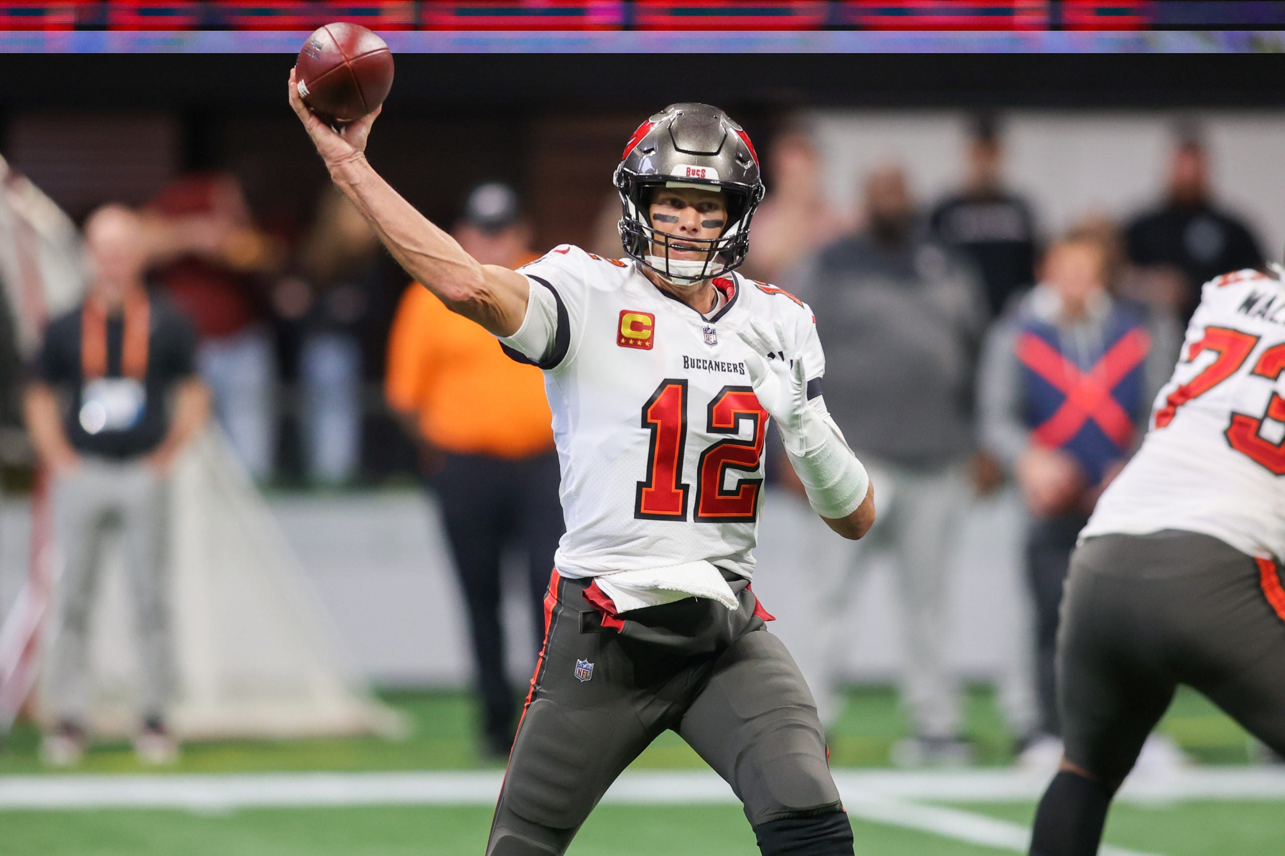 Jan 8, 2023; Atlanta, Georgia, USA; Tampa Bay Buccaneers quarterback Tom Brady (12) throws a pass against the Atlanta Falcons in the first quarter at Mercedes-Benz Stadium. Mandatory Credit: Brett Davis-USA TODAY Sports