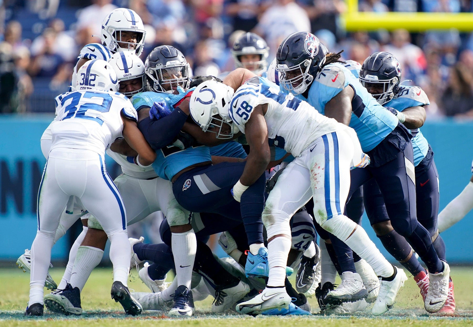 Tennessee Titans running back Derrick Henry (22) is pushed through the Indianapolis Colts defense during the fourth quarter at Nissan Stadium Sunday, Oct. 23, 2022, in Nashville, Tenn. Mandatory Credit: George Walker-The Tennesseean