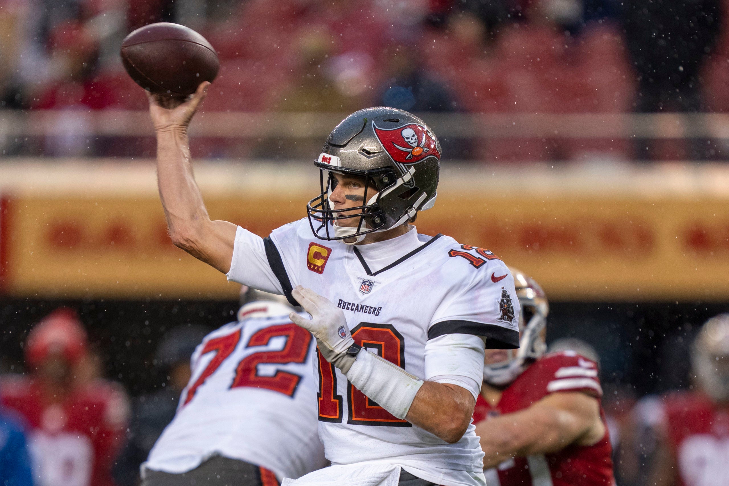 December 11, 2022; Santa Clara, California, USA; Tampa Bay Buccaneers quarterback Tom Brady (12) passes the football against the San Francisco 49ers during the fourth quarter at Levi's Stadium. Mandatory Credit: Kyle Terada-USA TODAY Sports