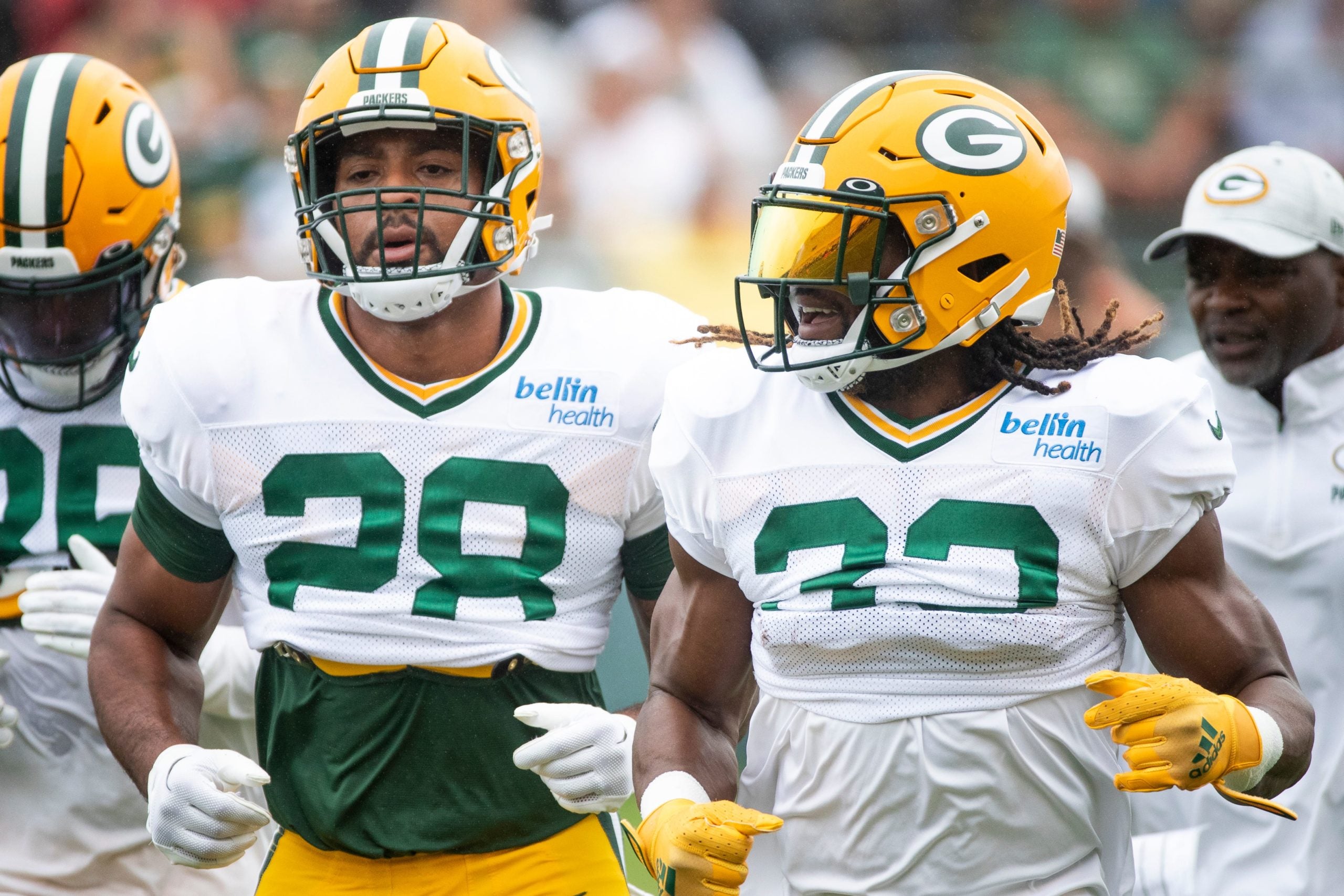 Green Bay Packers running back AJ Dillon (28) and running back Aaron Jones (33) run to their next drill during training camp on Monday, Aug. 8, 2022, at Ray Nitschke Field in Ashwaubenon, Wis. Samantha Madar/USA TODAY NETWORK-Wis. Gpg Training Camp 08082022 0002