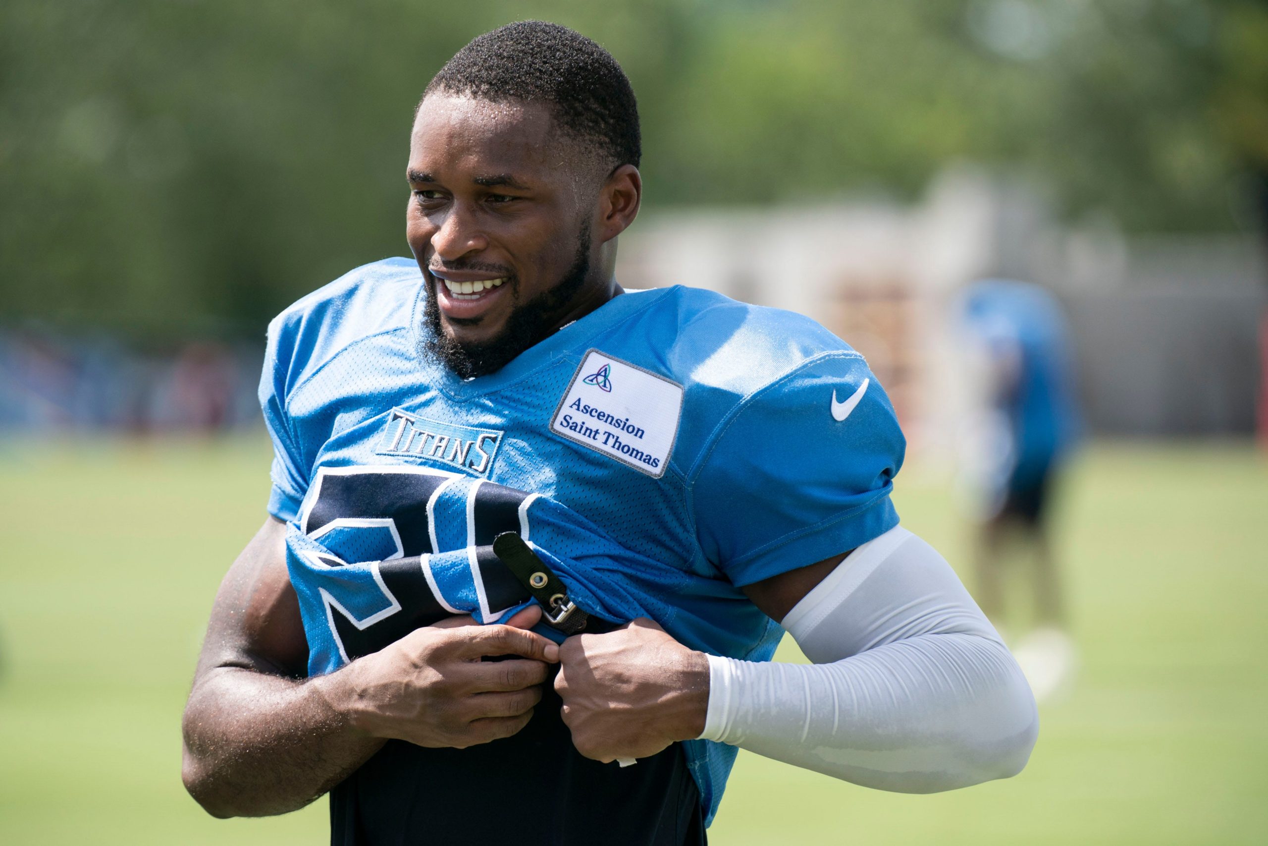 Tennessee Titans free safety Kevin Byard (31) takes off his shoulder pads after a training camp practice at Ascension Saint Thomas Sports Park Monday, Aug. 8, 2022, in Nashville, Tenn. Nas 0808 Titans 020