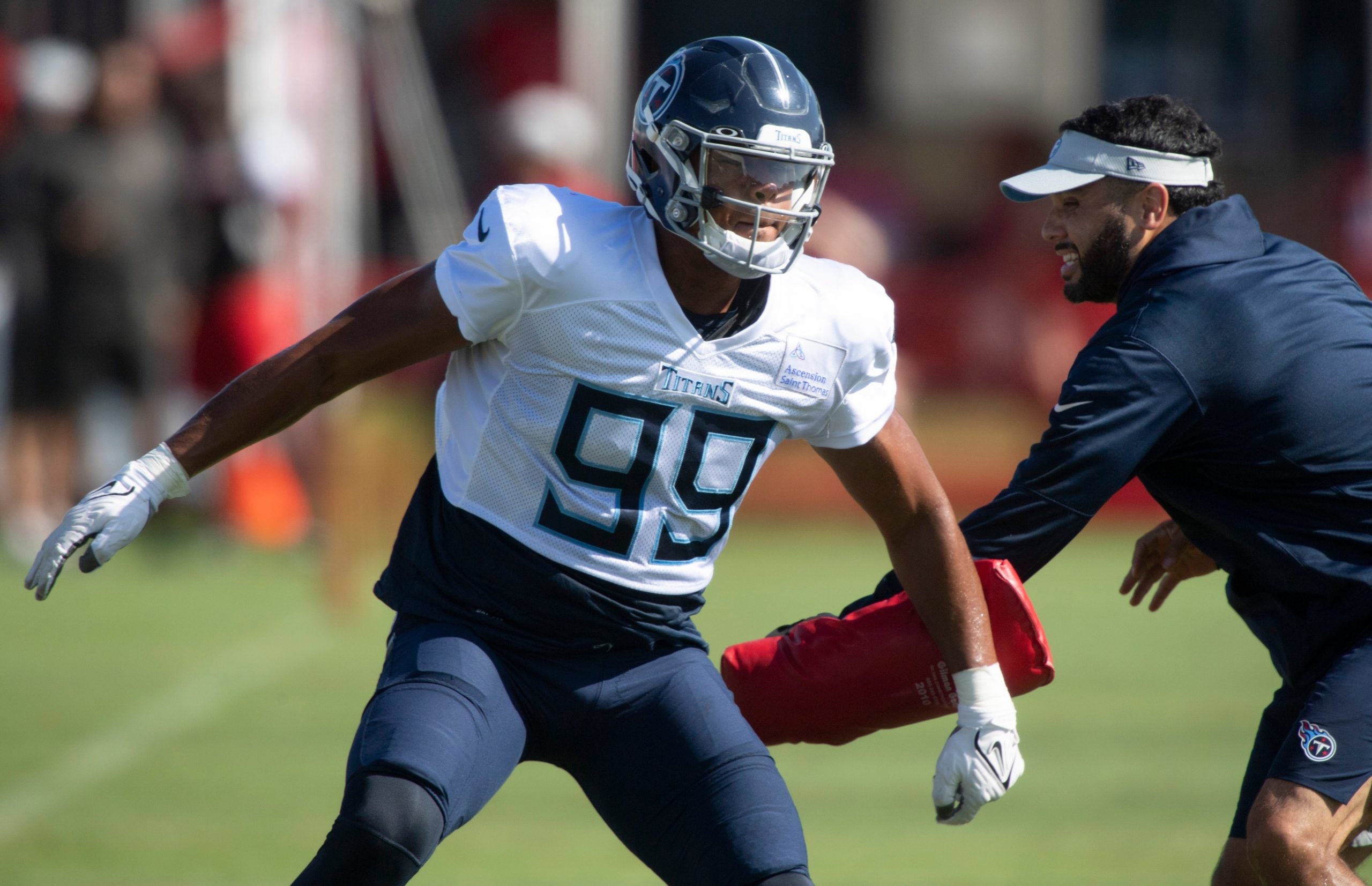 Tennessee Titans outside linebacker Rashad Weaver (99) runs through pass rush drills during a joint training camp practice against the Tampa Bay Buccaneers at AdventHealth Training Center Thursday, Aug. 19, 2021 in Tampa, Fla. Nas Titans Bucs 020