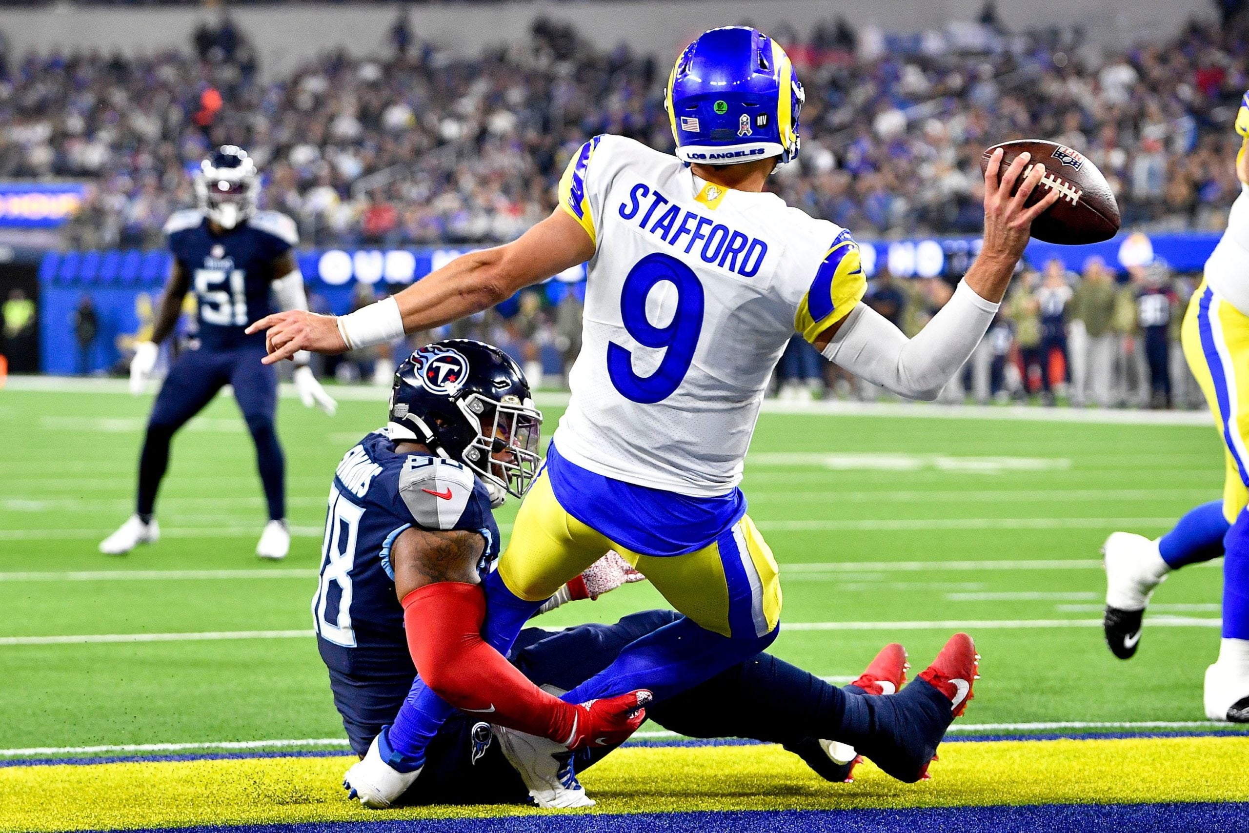 Tennessee Titans defensive tackle Jeffery Simmons (98) pressures Los Angeles Rams quarterback Matthew Stafford (9) and forces him to throw an interception during the second quarter at SoFI Stadium Sunday, Nov. 7, 2021 in Inglewood, Calif. Titans Rams 061