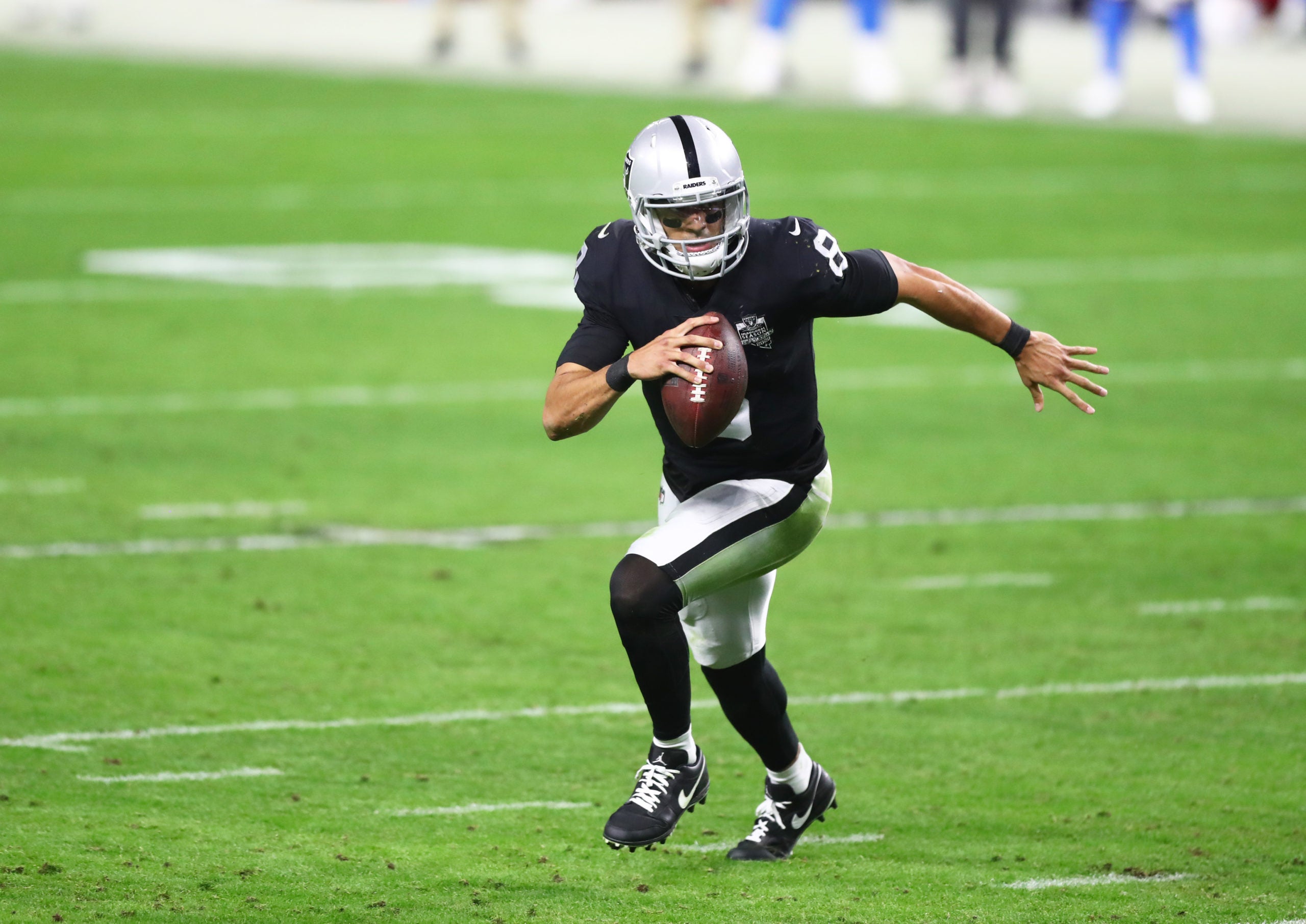 Dec 17, 2020; Paradise, Nevada, USA; Las Vegas Raiders quarterback Marcus Mariota (8) against the Los Angeles Chargers at Allegiant Stadium. Mandatory Credit: Mark J. Rebilas-USA TODAY Sports