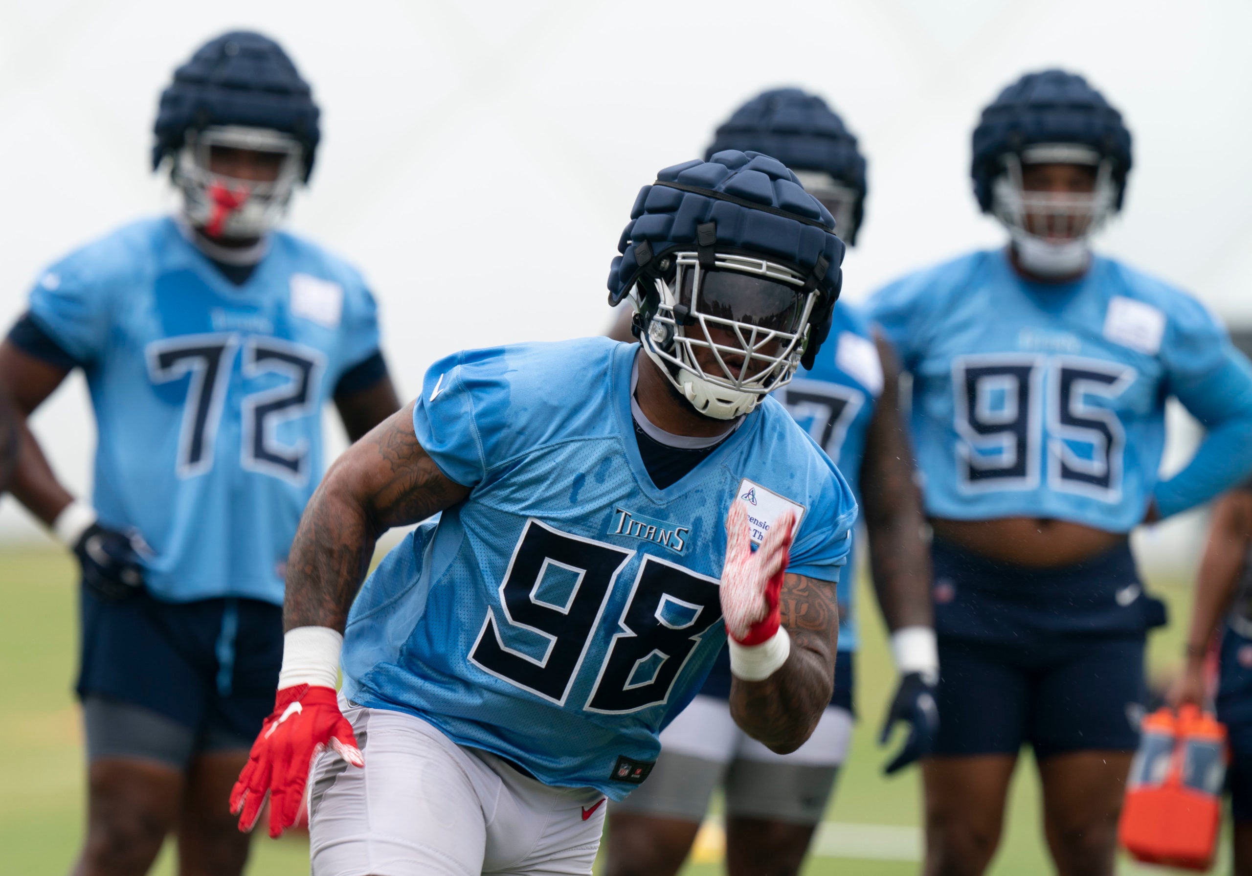 Jul 28, 2022; Nashville, Tennessee, USA; Tennessee Titans defensive end Jeffery Simmons (98) runs a pass rush drill during a training camp practice at Saint Thomas Sports Park.  Mandatory Credit: George Walker IV-USA TODAY Sports