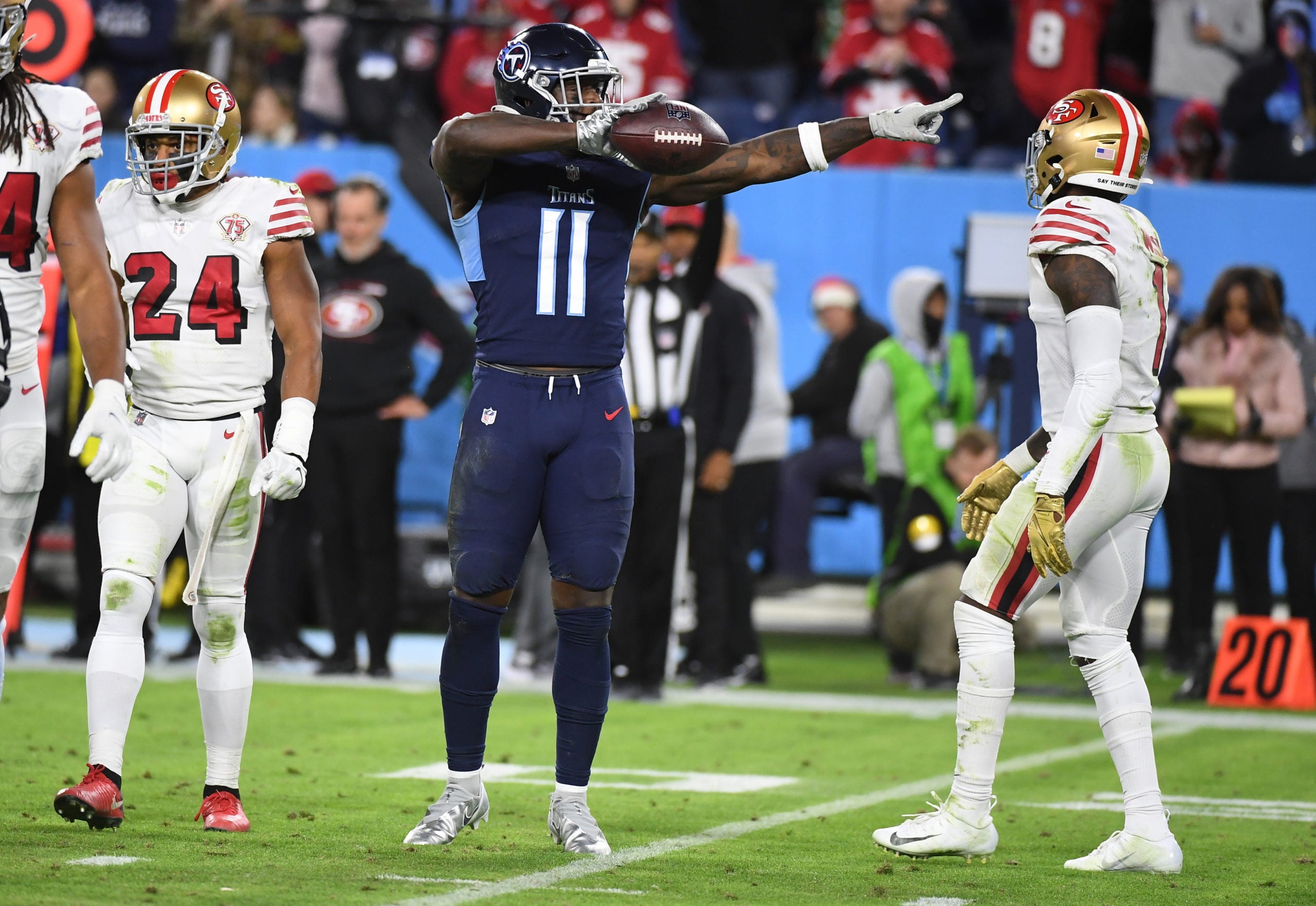 Dec 23, 2021; Nashville, Tennessee, USA; Tennessee Titans wide receiver A.J. Brown (11) reacts after a first down during the second half against the San Francisco 49ers at Nissan Stadium. Mandatory Credit: Christopher Hanewinckel-USA TODAY Sports