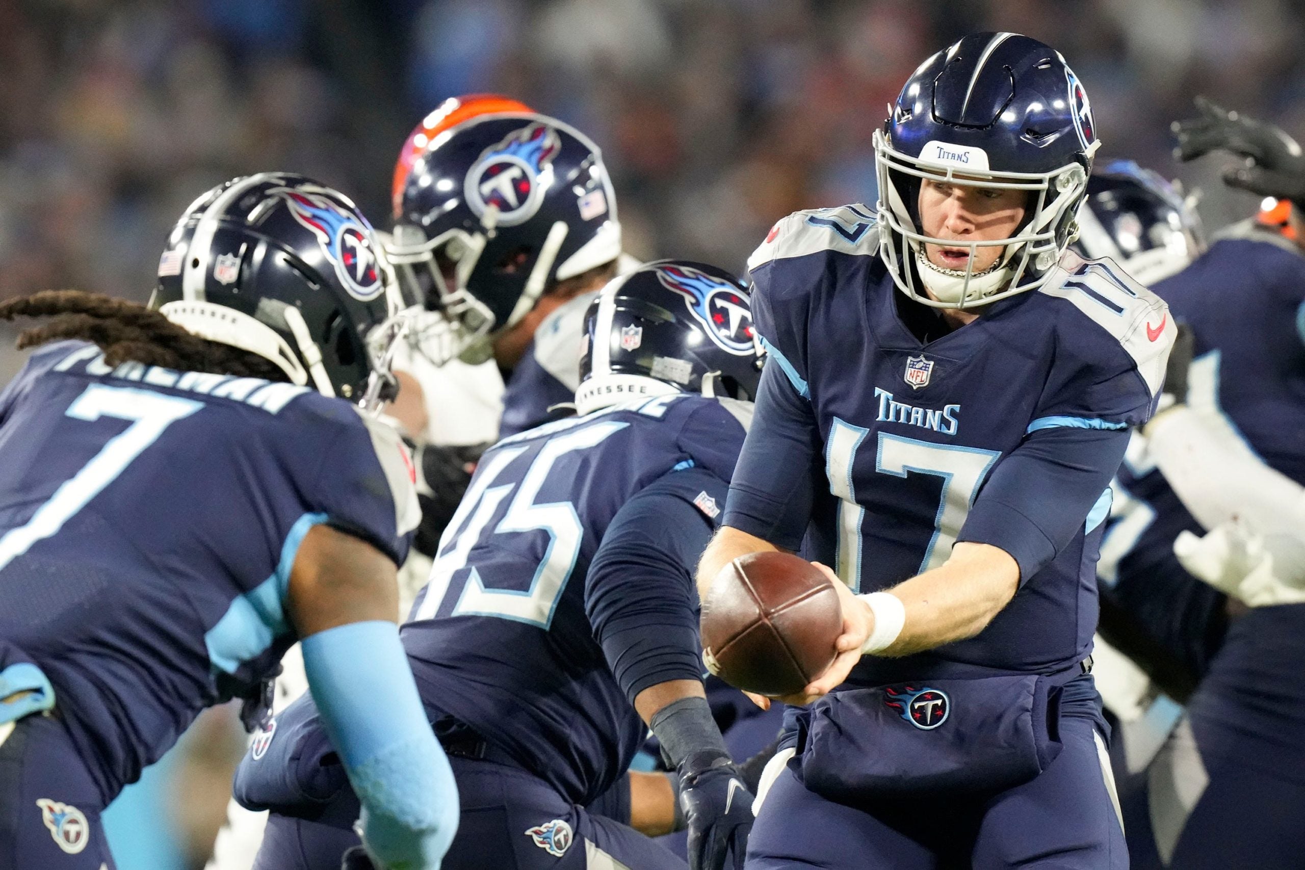 Tennessee Titans quarterback Ryan Tannehill (17) hands off to running back D'onta Foreman (7) during the fourth quarter of an AFC divisional playoff game at Nissan Stadium Friday, Jan. 22, 2021 in Nashville, Tenn. Titans Bengals 253