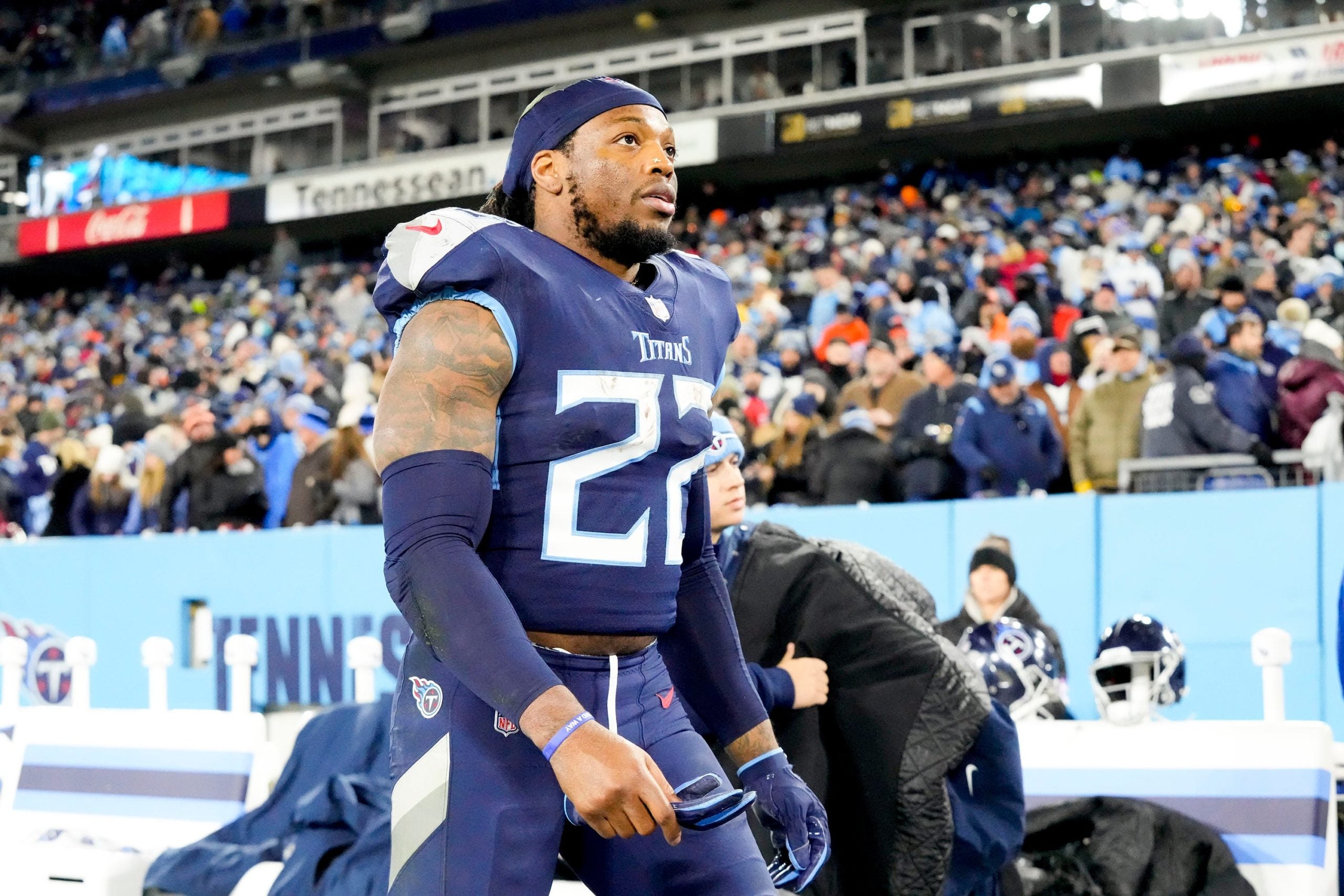 Tennessee Titans running back Derrick Henry (22) leaves the field after losing to the Bengals during the AFC divisional playoff game at Nissan Stadium Saturday, Jan. 22, 2022 in Nashville, Tenn. Titans Bengals 283
