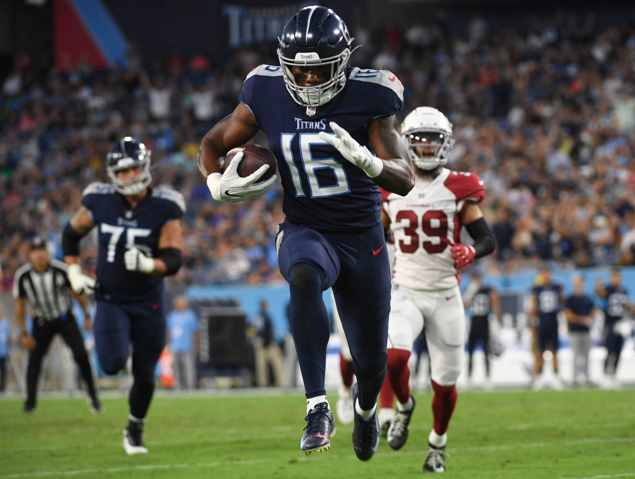 Tennessee Titans wide receiver Treylon Burks (16) races into the end zone for a touchdown against the Arizona Cardinals during the second quarter of an NFL preseason game at Nissan Stadium Saturday, Aug. 27, 2022, in Nashville, Tenn. Nas Titans Cardinals 078