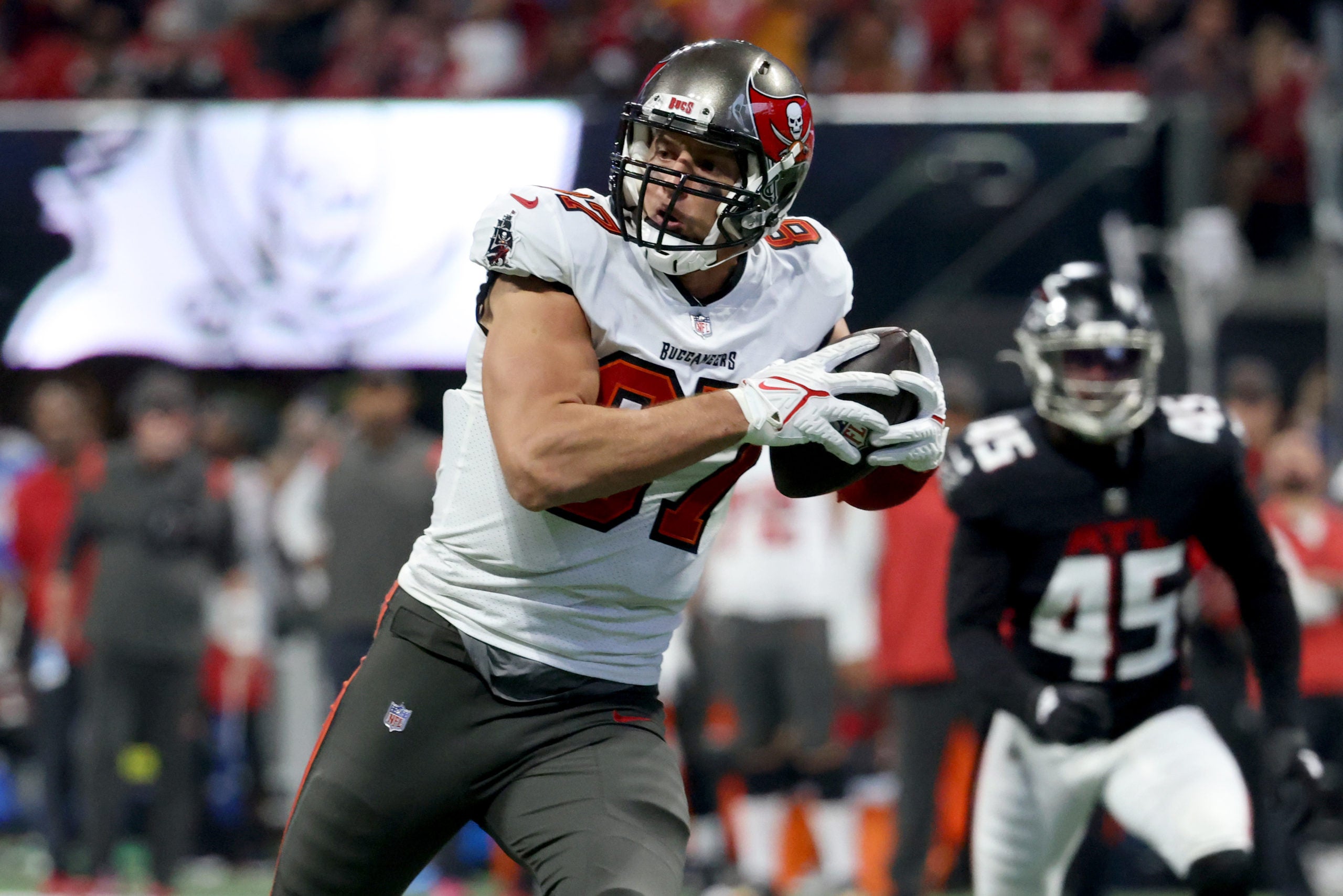 Dec 5, 2021; Atlanta, Georgia, USA; Tampa Bay Buccaneers tight end Rob Gronkowski (87) scores a touchdown during the second quarter against the Atlanta Falcons at Mercedes-Benz Stadium. Mandatory Credit: Jason Getz-USA TODAY Sports
