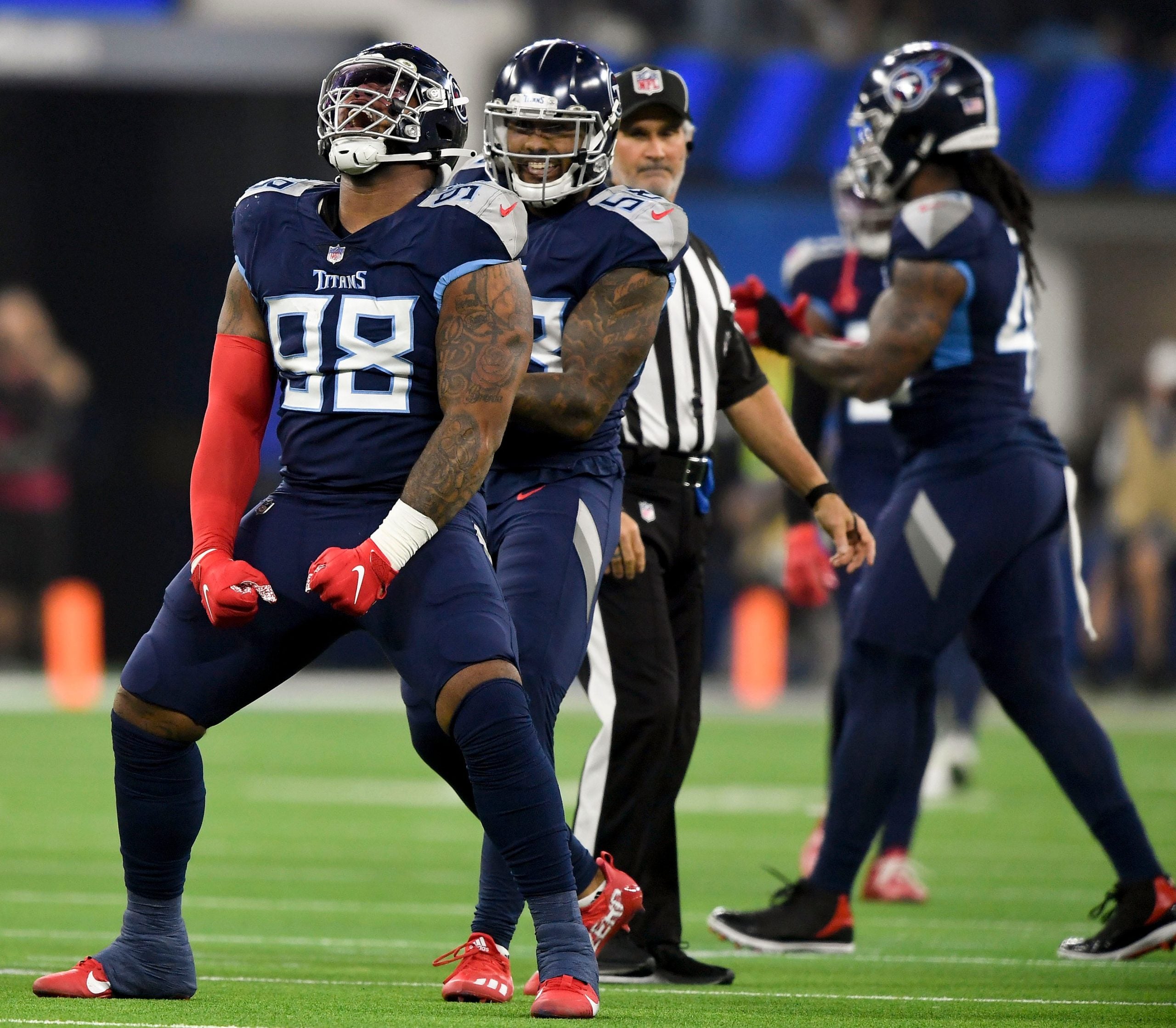 Tennessee Titans defensive tackle Jeffery Simmons (98) celebrates after sacking Los Angeles Rams quarterback Matthew Stafford (9) during the first quarter at SoFI Stadium Sunday, Nov. 7, 2021 in Inglewood, Calif. Titans Rams 038