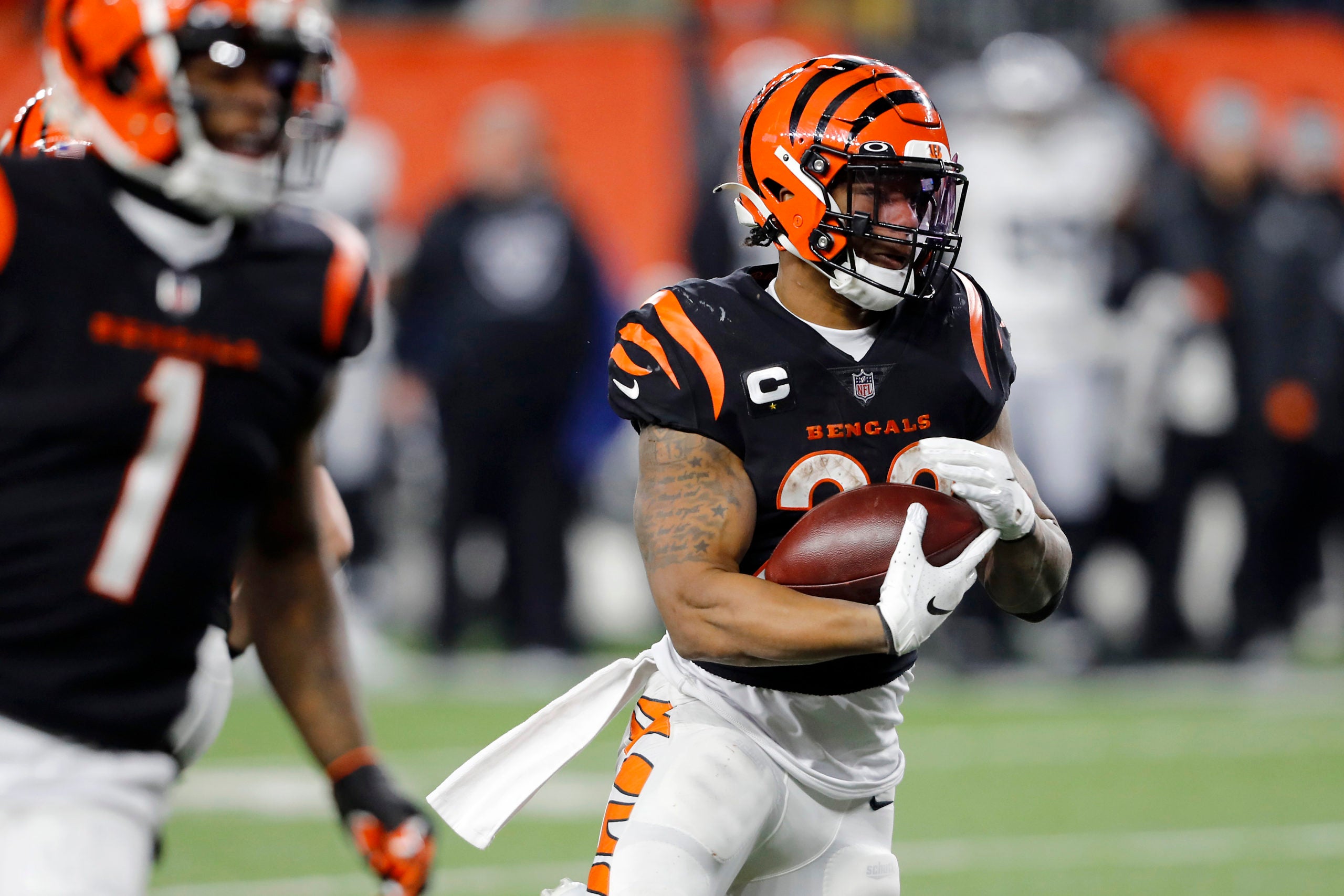 Jan 15, 2022; Cincinnati, Ohio, USA; Cincinnati Bengals wide receiver Tee Higgins (85) runs during the fourth quarter in the AFC Wild Card playoff football game against the Las Vegas Raiders at Paul Brown Stadium. Mandatory Credit: Joseph Maiorana-USA TODAY Sports