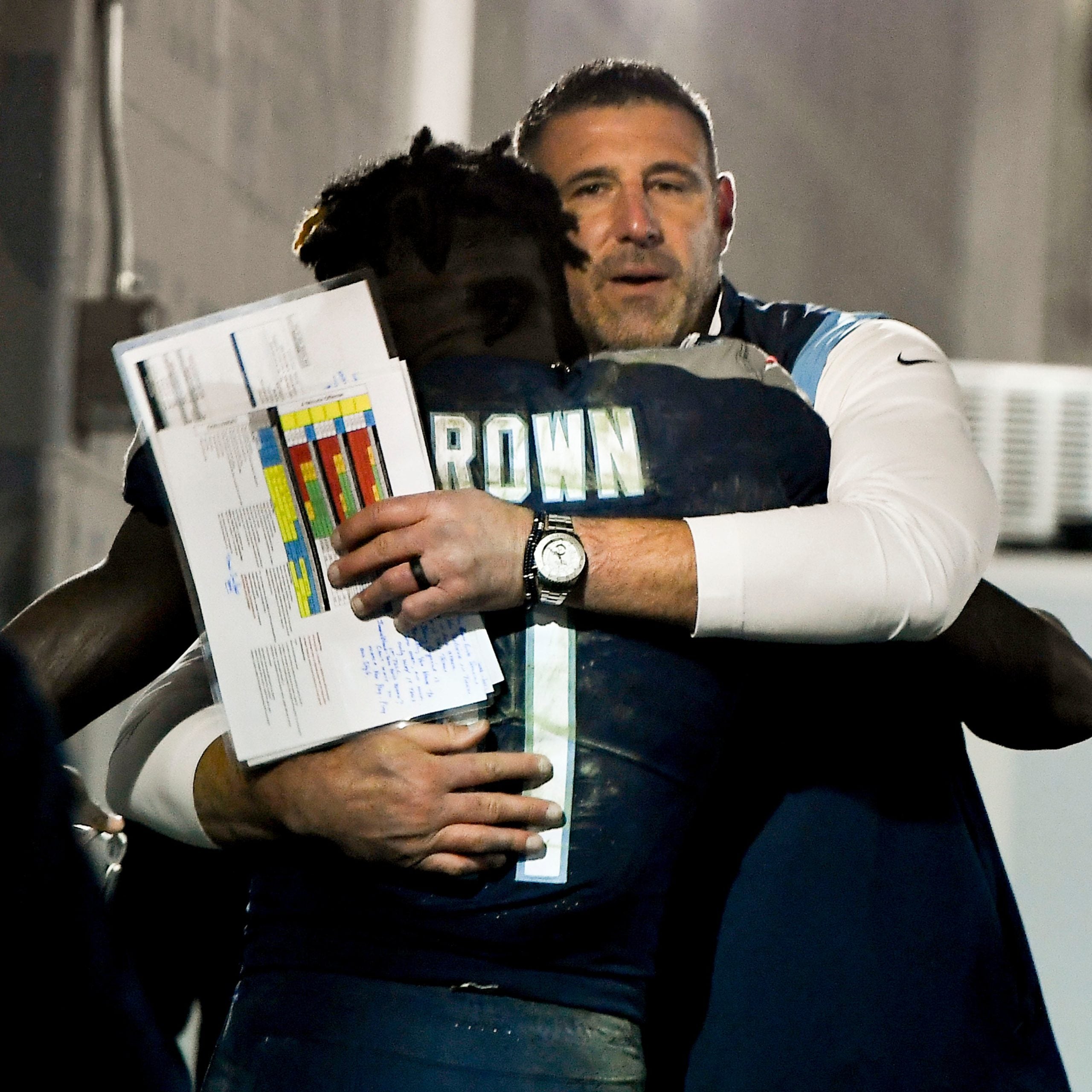 Tennessee Titans head coach Mike Vrabel hugs wide receiver A.J. Brown (11) after they beat the 49ers at Nissan Stadium Thursday, Dec. 23, 2021 in Nashville, Tenn. Titans 49ers 245