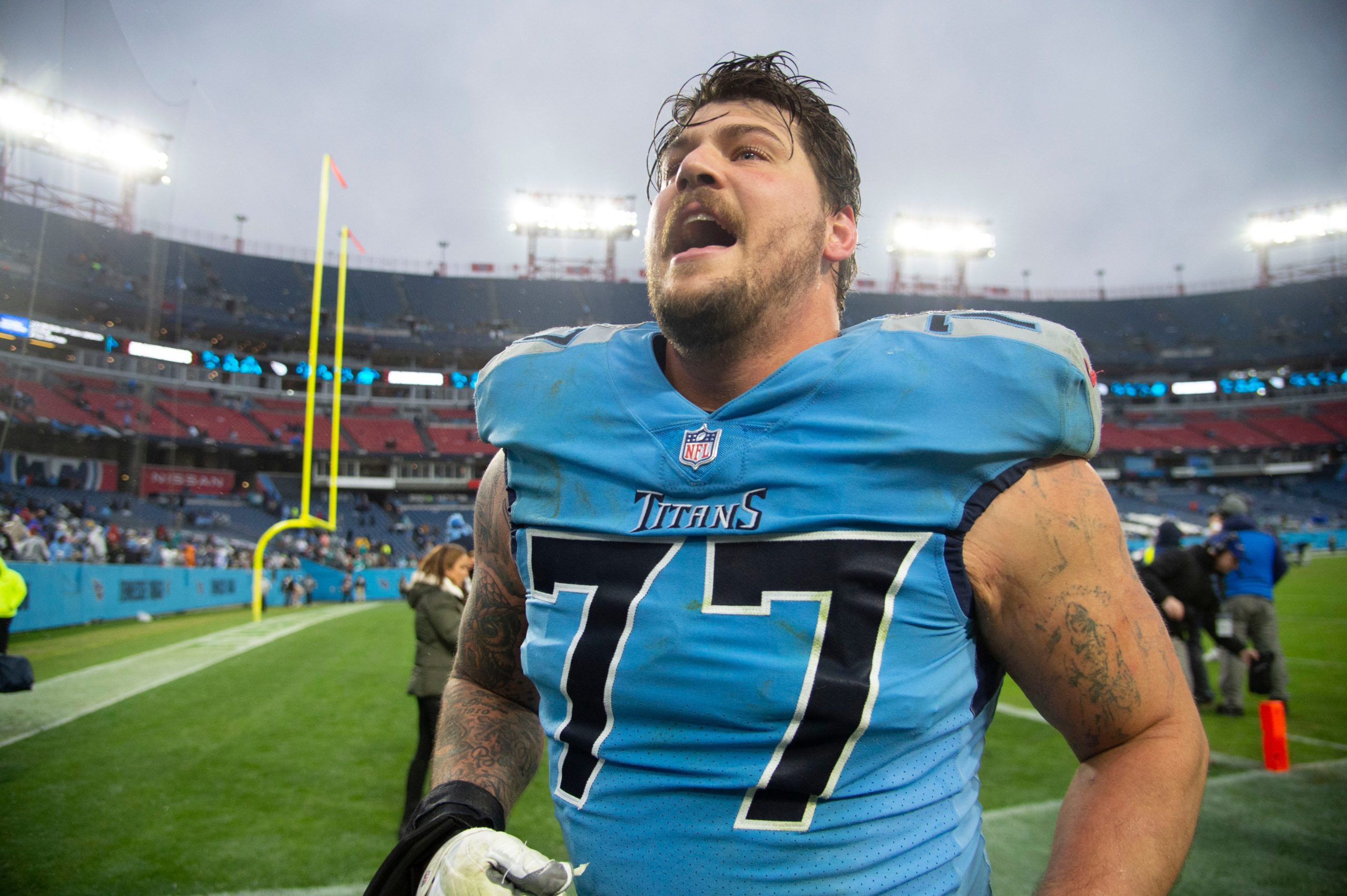 Tennessee Titans offensive tackle Taylor Lewan (77) celebrates their 34 to 3 win against the Miami Dolphins at Nissan Stadium Sunday, Jan. 2, 2022 in Nashville, Tenn. Nas Titans Dolphins 010