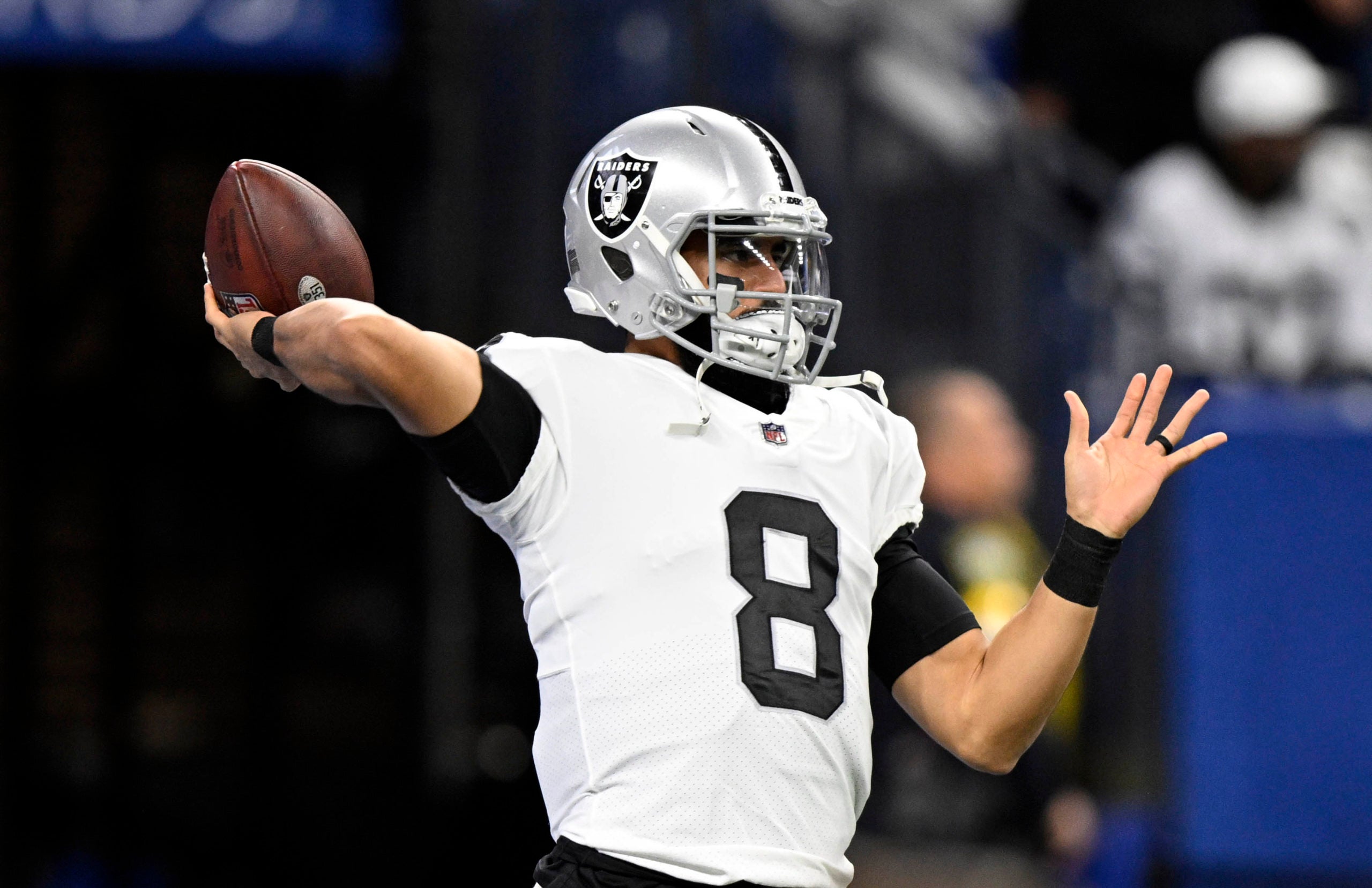 Jan 2, 2022; Indianapolis, Indiana, USA;  Las Vegas Raiders quarterback Marcus Mariota (8) throws a ball during warmups before the game against the Indianapolis Colts at Lucas Oil Stadium. Mandatory Credit: Marc Lebryk-USA TODAY Sports