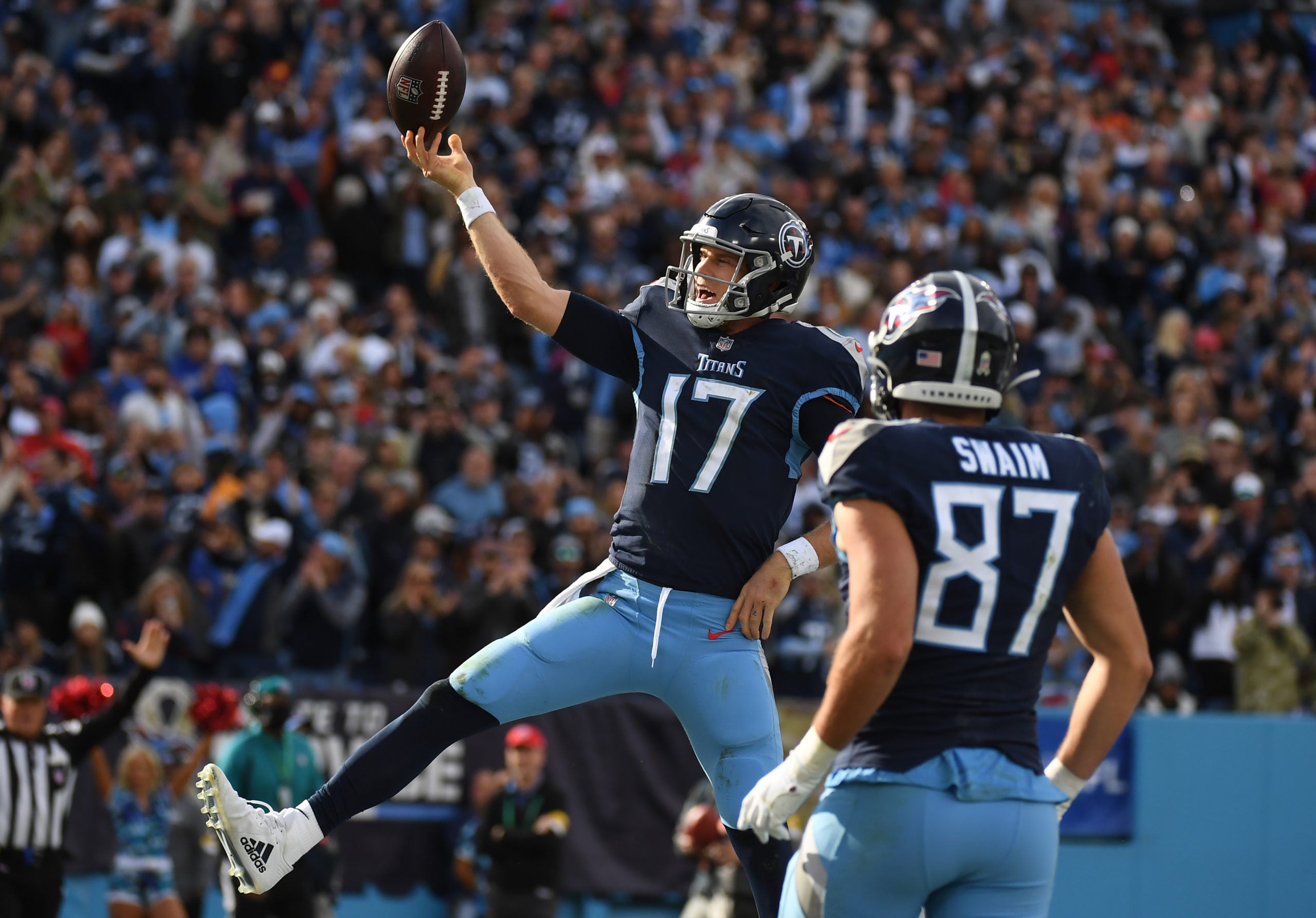 Nov 14, 2021; Nashville, Tennessee, USA; Tennessee Titans quarterback Ryan Tannehill (17) celebrates after a touchdown during the first half against the New Orleans Saints at Nissan Stadium. Mandatory Credit: Christopher Hanewinckel-USA TODAY Sports