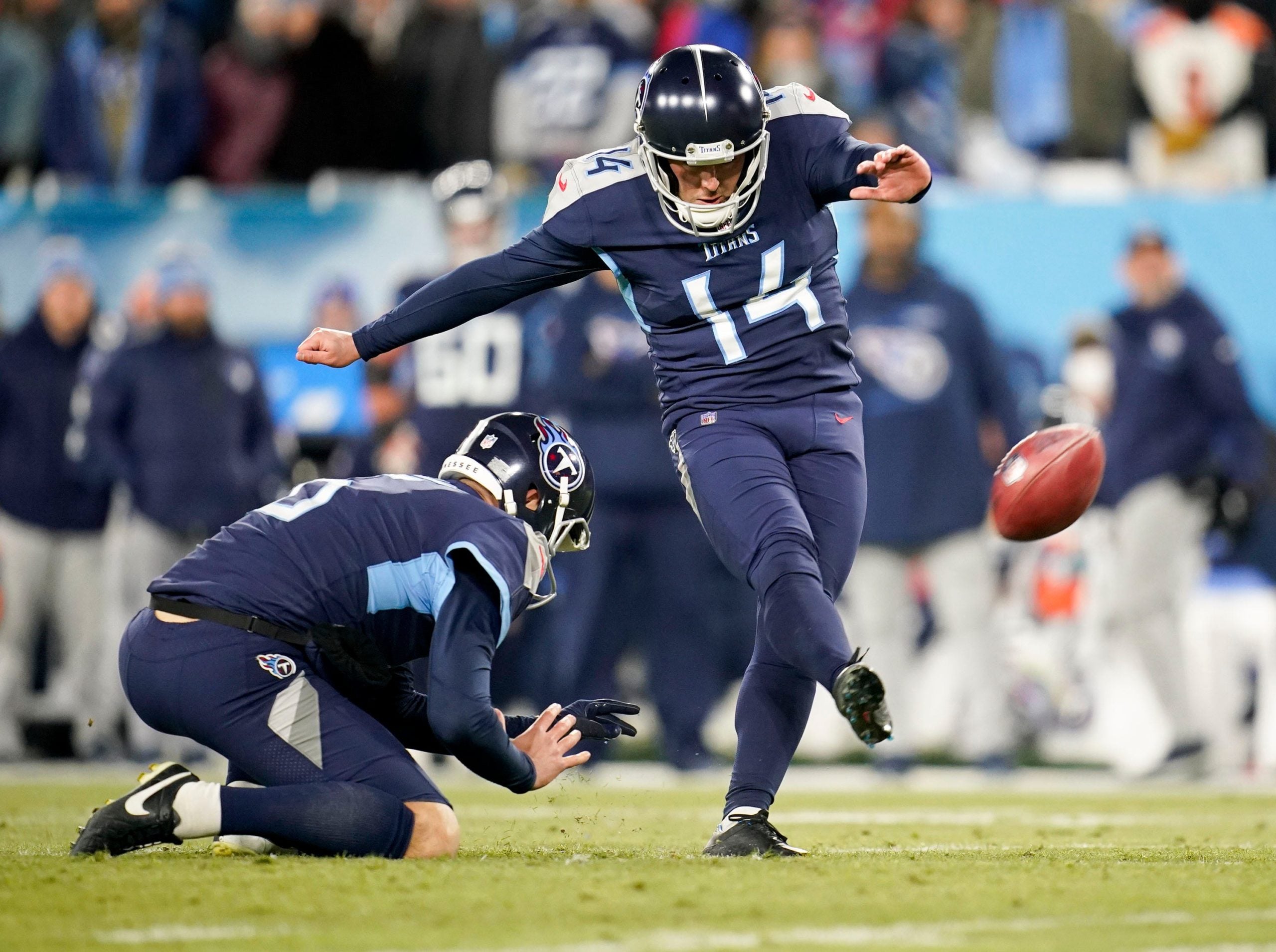 Tennessee Titans kicker Randy Bullock (14) kicks a field goal during the third quarter of an AFC divisional playoff game at Nissan Stadium Saturday, Jan. 22, 2022 in Nashville, Tenn. Titans Bengals 215