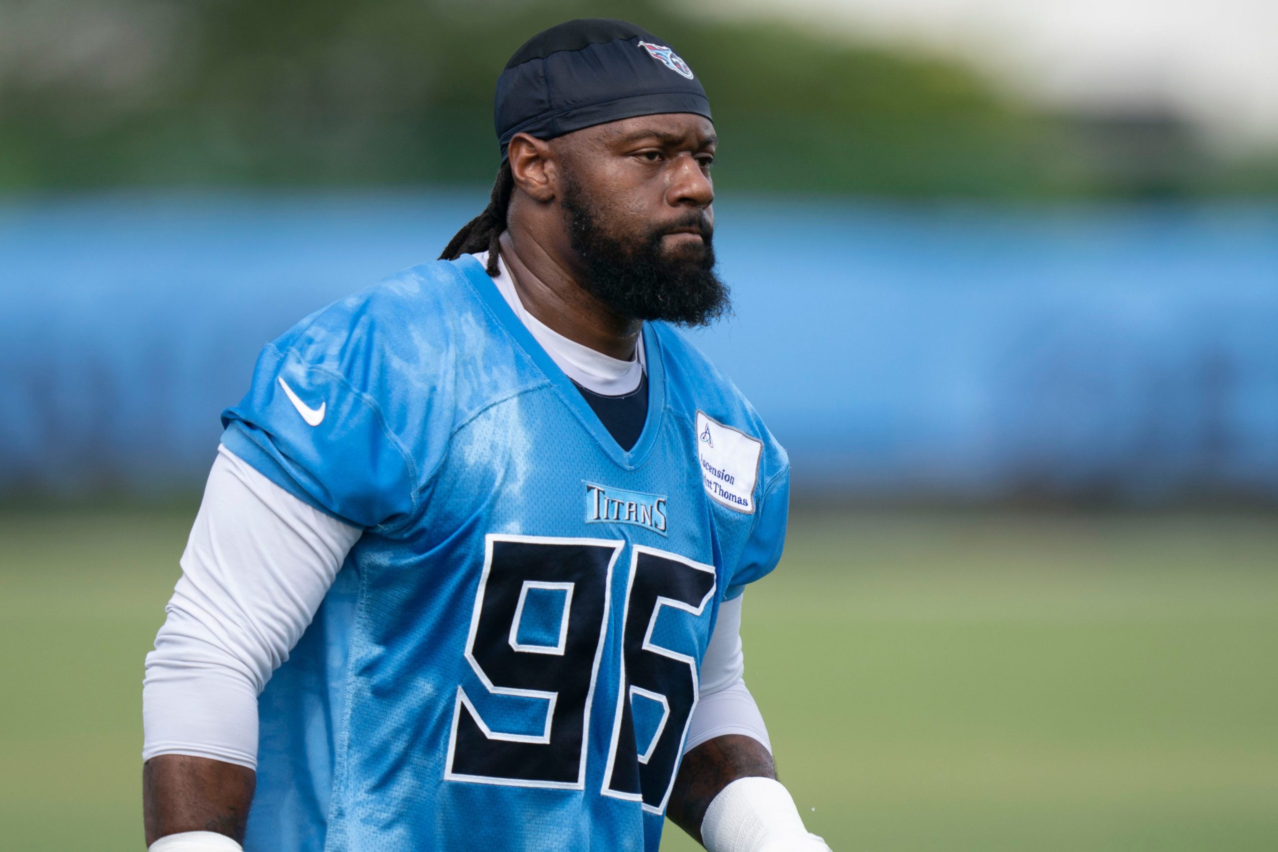 Tennessee Titans defensive end Denico Autry (96) walks across the field during a training camp practice at Ascension Saint Thomas Sports Park Saturday, July 30, 2022, in Nashville, Tenn. Nas 0730 Titans 030
