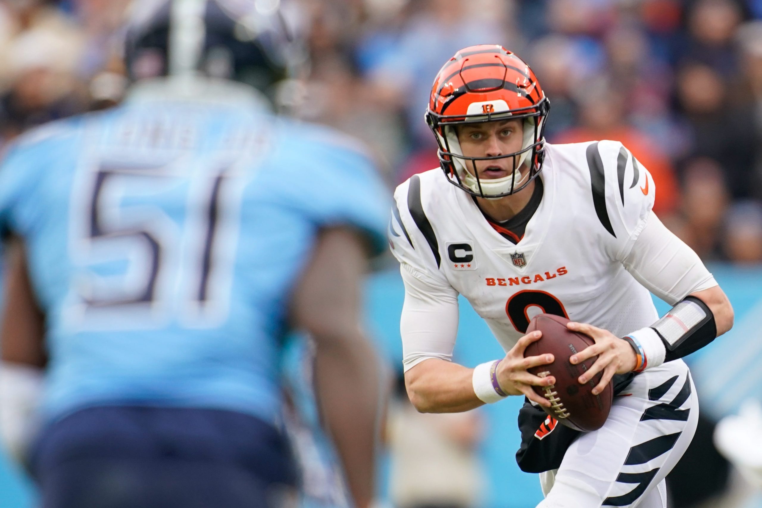 Cincinnati Bengals quarterback Joe Burrow (9) looks for an opening to pass as they face the Tennessee Titans during the second quarter at Nissan Stadium Sunday, Nov. 27, 2022, in Nashville, Tenn. Nfl Cincinnati Bengals At Tennessee Titans Syndication The Tennessean