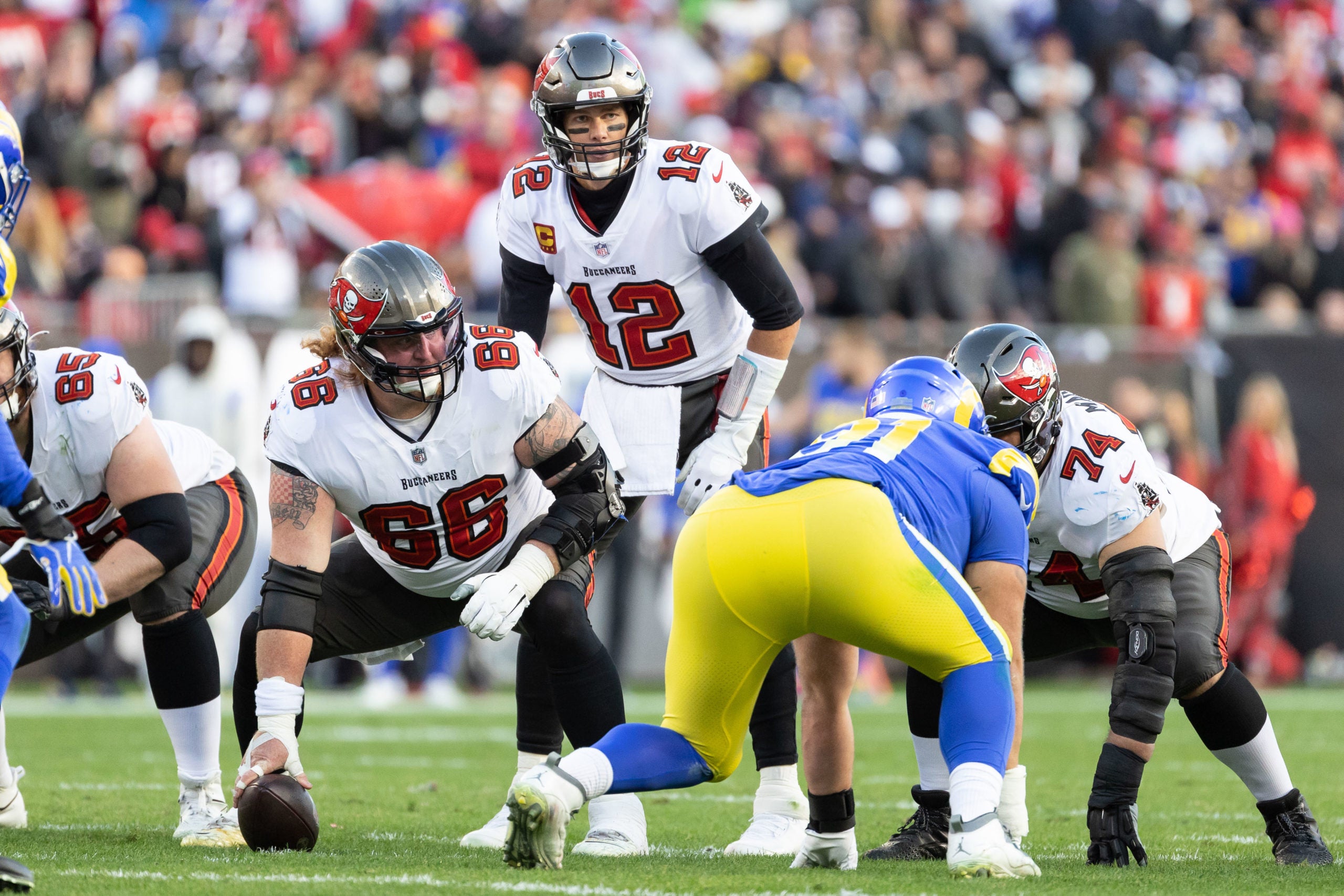 Jan 23, 2022; Tampa, Florida, USA; Tampa Bay Buccaneers quarterback Tom Brady (12) looks at the defense during the first half against the Los Angeles Rams during a NFC Divisional playoff football game at Raymond James Stadium. Mandatory Credit: Matt Pendleton-USA TODAY Sports