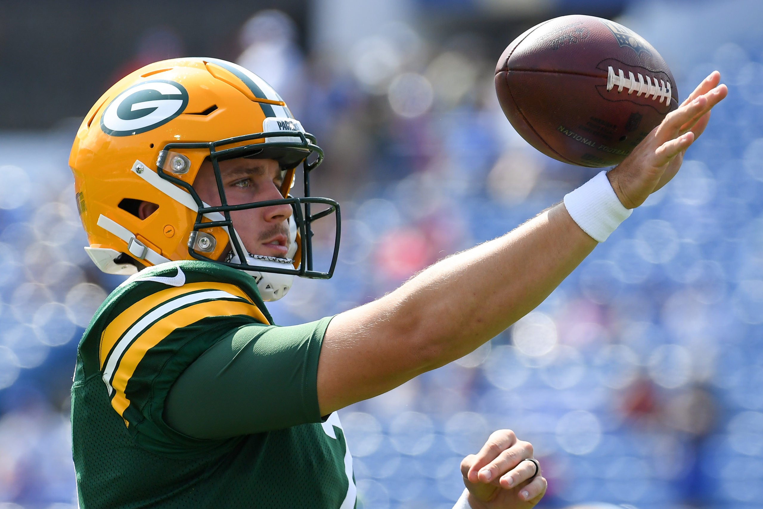 Aug 28, 2021; Orchard Park, New York, USA; Green Bay Packers quarterback Kurt Benkert (7) balances a ball on his hand prior to the game against the Buffalo Bills at Highmark Stadium. Mandatory Credit: Rich Barnes-USA TODAY Sports