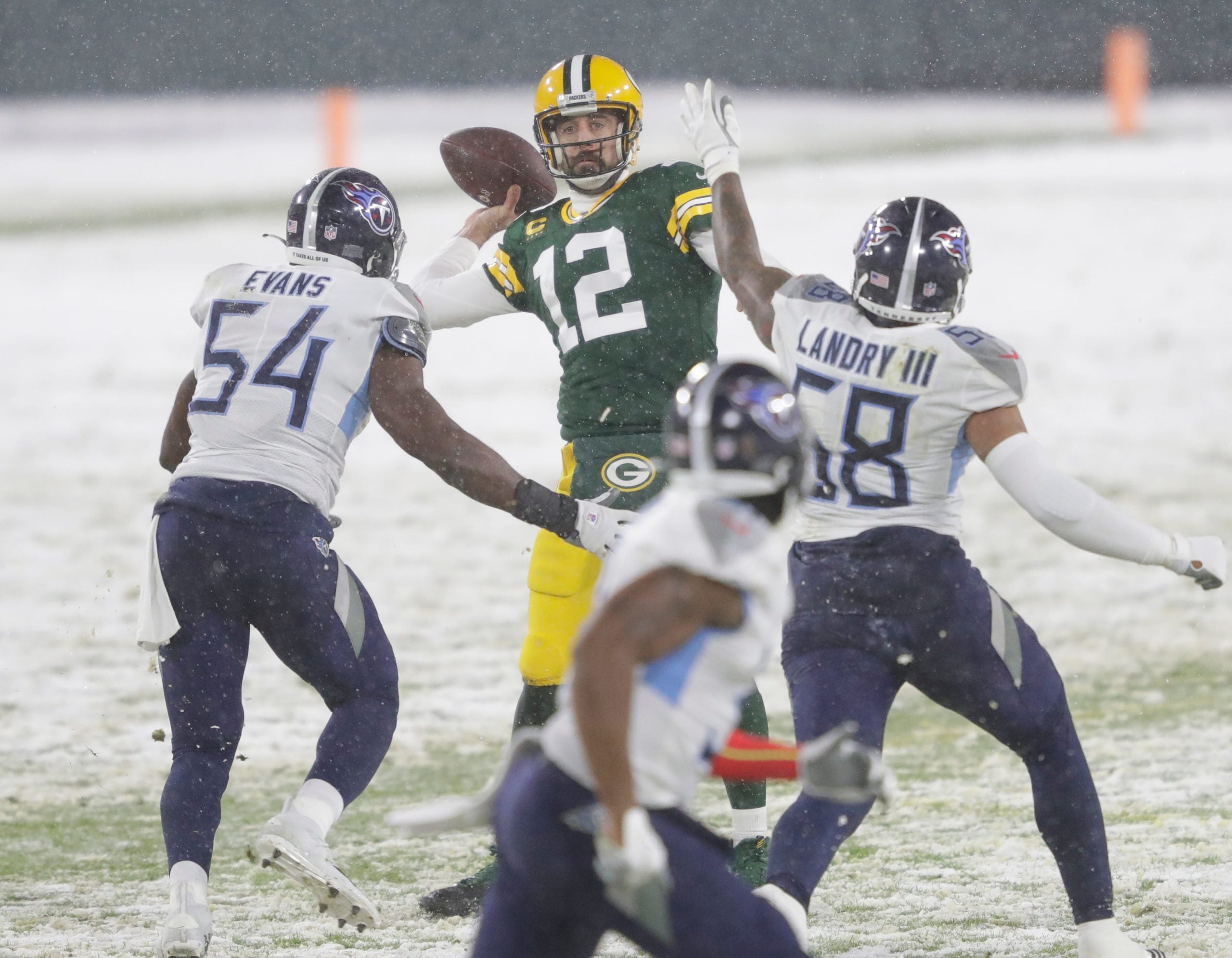 Green Bay Packers quarterback Aaron Rodgers (12) passes against the Tennessee Titans during their football game Sunday, December 27, 2020, at Lambeau Field in Green Bay, Wis. Dan Powers/USA TODAY NETWORK-Wisconsin Apc Packvstitans 1227200279e