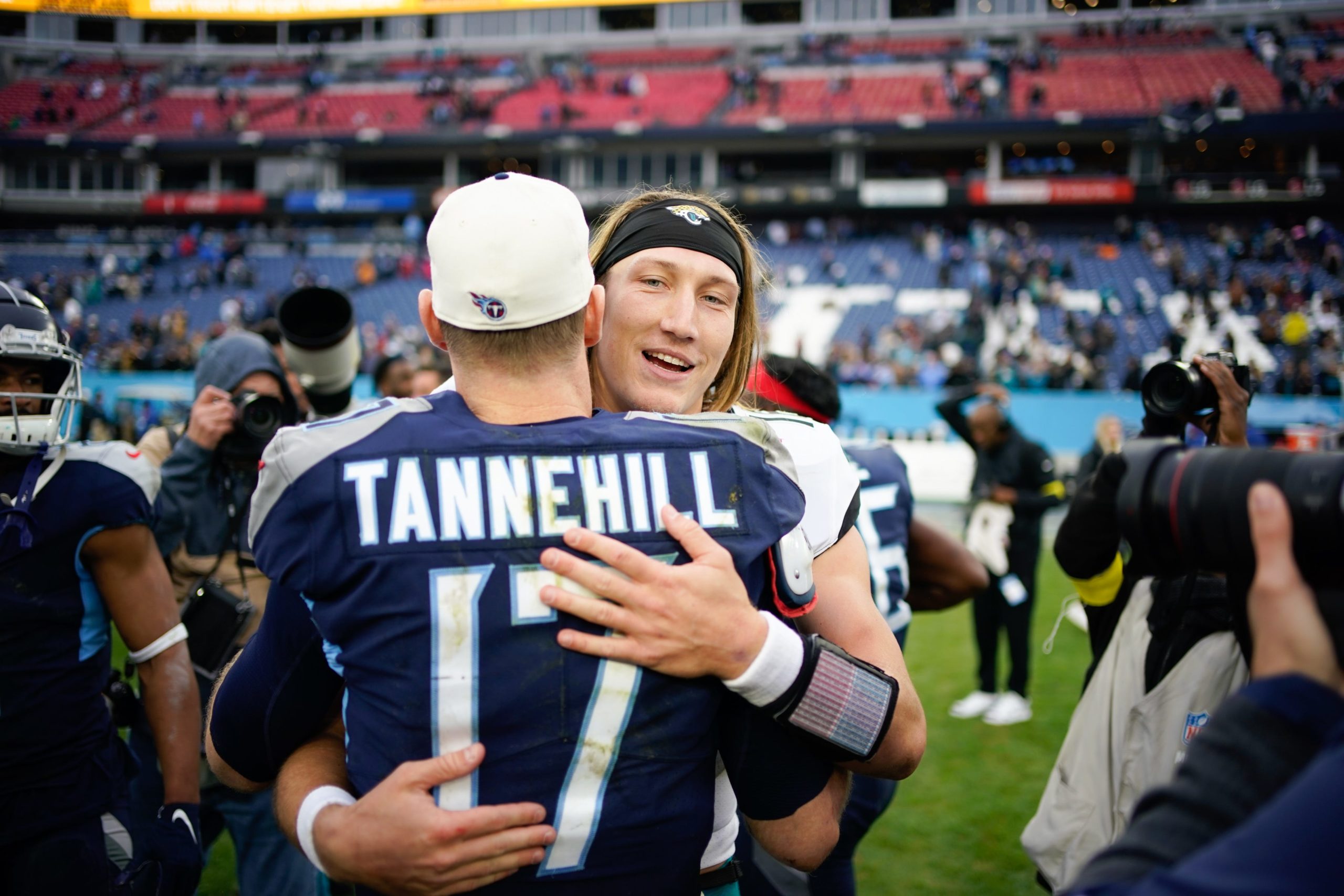 Tennessee Titans quarterback Ryan Tannehill (17) hugs Jacksonville Jaguars quarterback Trevor Lawrence (16) after losing to the Jacksonville Jaguars at Nissan Stadium Sunday, Dec. 11, 2022, in Nashville, Tenn. Nfl Jacksonville Jaguars At Tennessee Titans