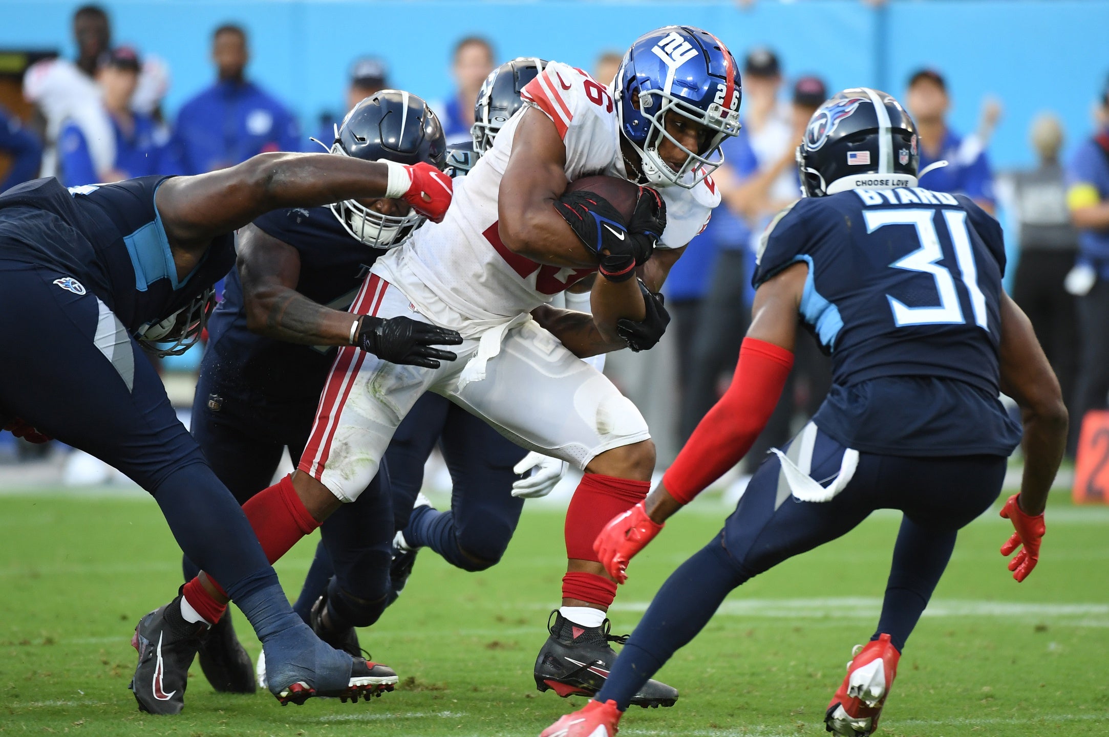 Sep 11, 2022; Nashville, Tennessee, USA; New York Giants running back Saquon Barkley (26) runs for a short gain during the second half against the Tennessee Titans at Nissan Stadium. Mandatory Credit: Christopher Hanewinckel-USA TODAY Sports