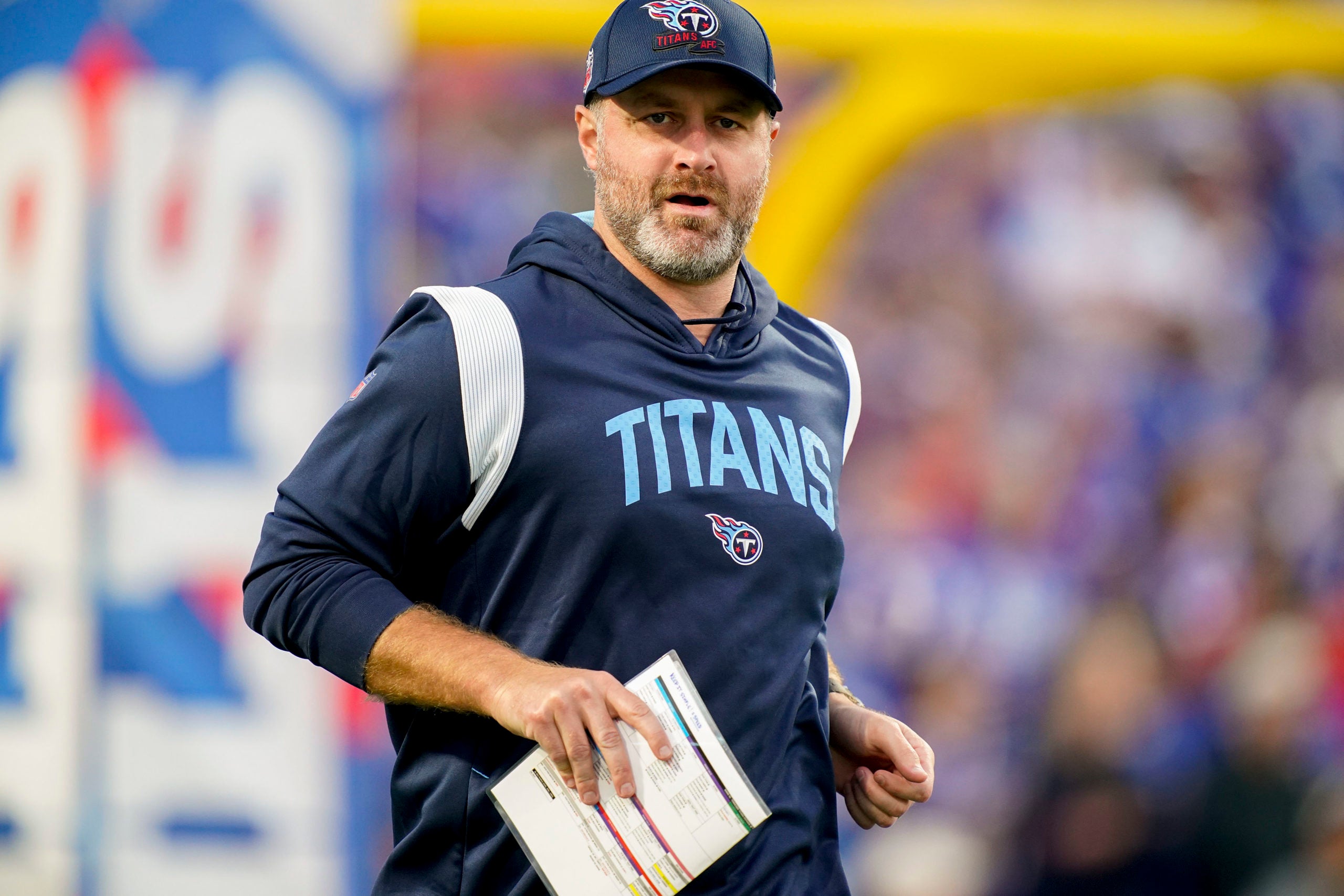 Sep 19, 2022; Orchard Park, New York, USA; Tennessee Titans defensive coordinator Shane Bowen runs on the field as they get ready to face the Buffalo Bills at Highmark Stadium. Mandatory Credit: George Walker IV -USA TODAY Sports