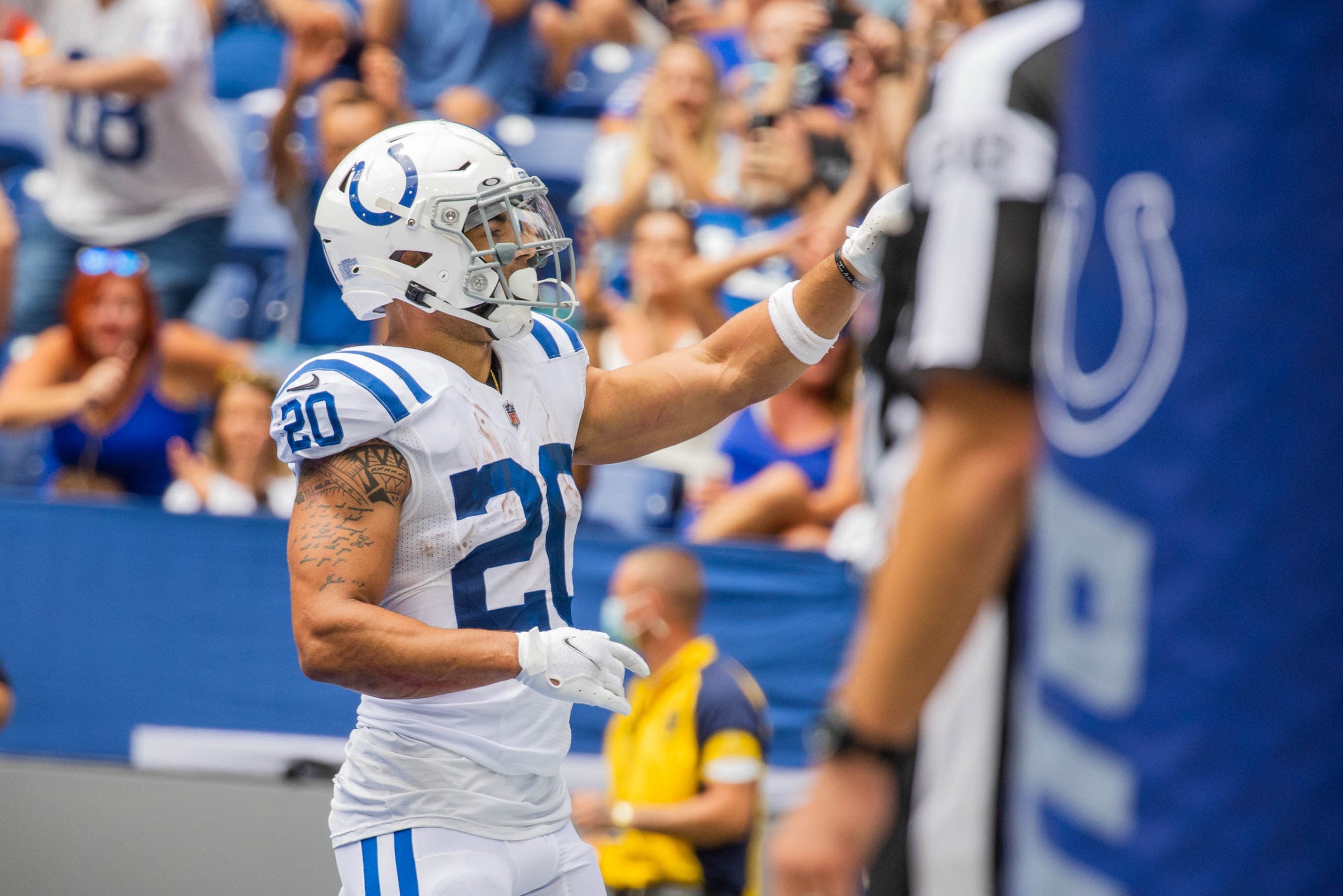 Aug 15, 2021; Indianapolis, Indiana, USA; Indianapolis Colts running back Jordan Wilkins (20) celebrates his touchdown in the first half against the Carolina Panthers at Lucas Oil Stadium. Mandatory Credit: Trevor Ruszkowski-USA TODAY Sports