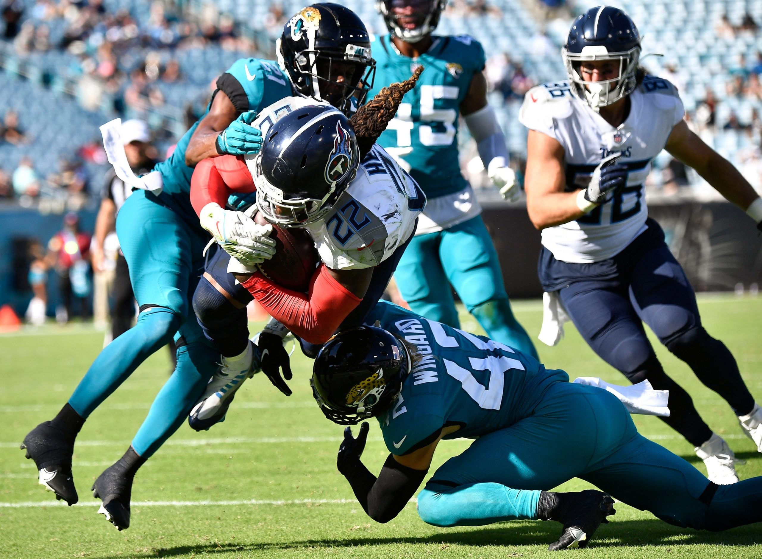 Tennessee Titans running back Derrick Henry (22) dives into the end zone for a touchdown against the Jaguars at TIAA Bank Field Sunday, Oct. 10, 2021 in Jacksonville, Fla. Titans Jaguars 107