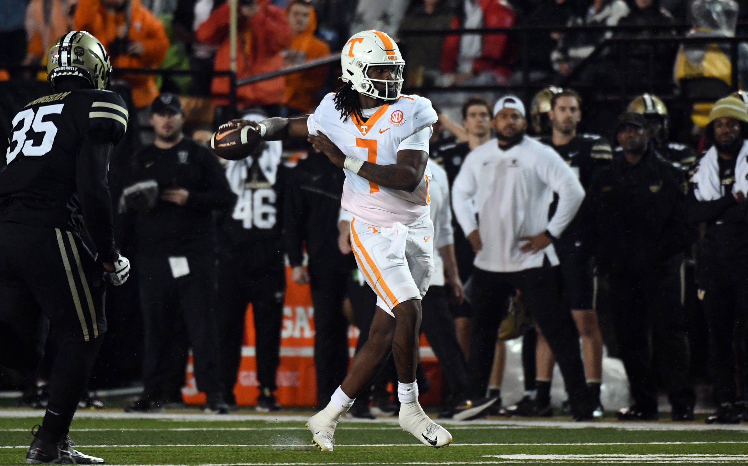 Nov 26, 2022; Nashville, Tennessee, USA; Tennessee Volunteers quarterback Joe Milton III (7) rolls out to pass against the Vanderbilt Commodores during the first half at FirstBank Stadium. Mandatory Credit: Christopher Hanewinckel-USA TODAY Sports